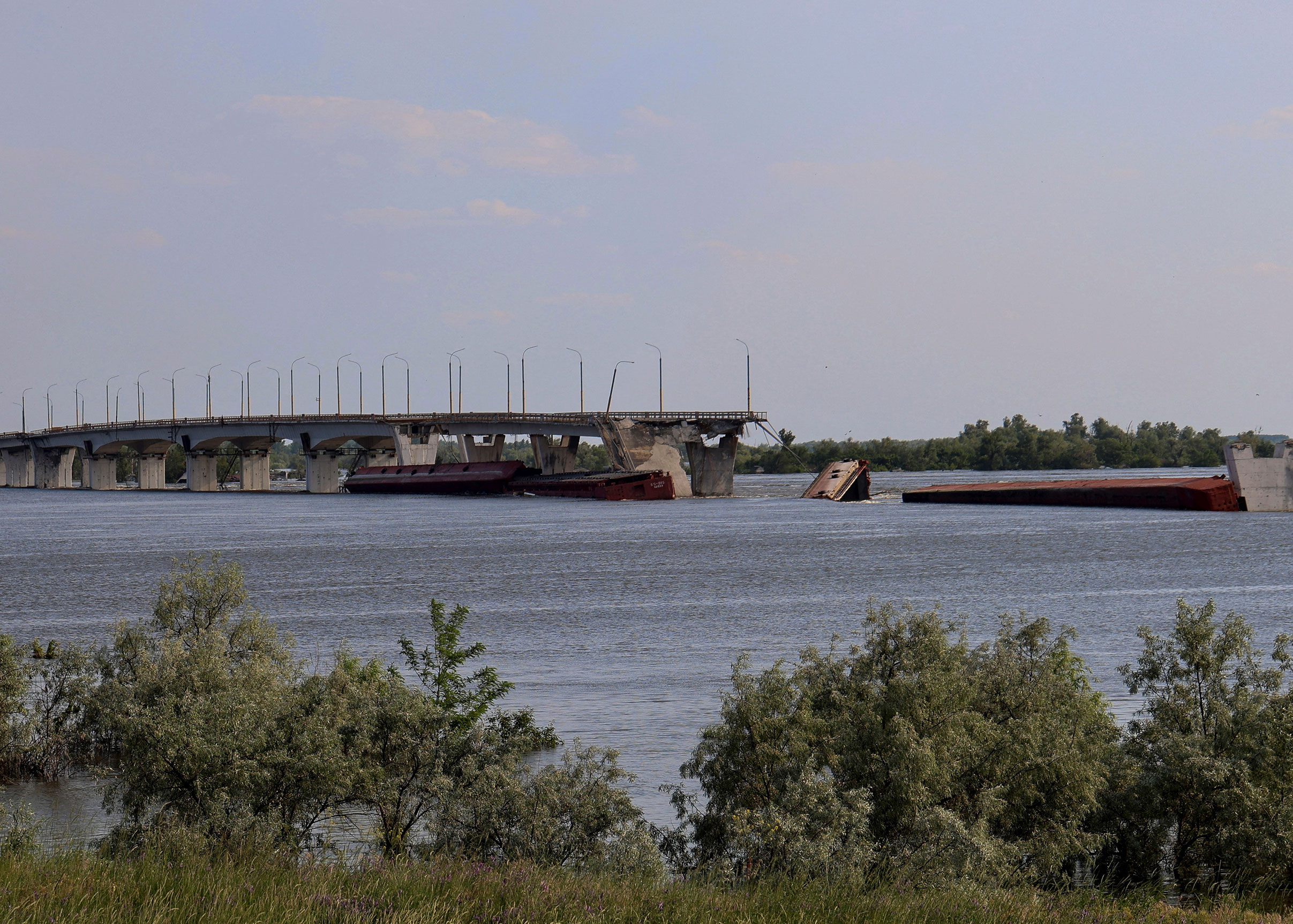 The Antonivskyi Bridge over the flooded Dnipro River is pictured June 8. 
