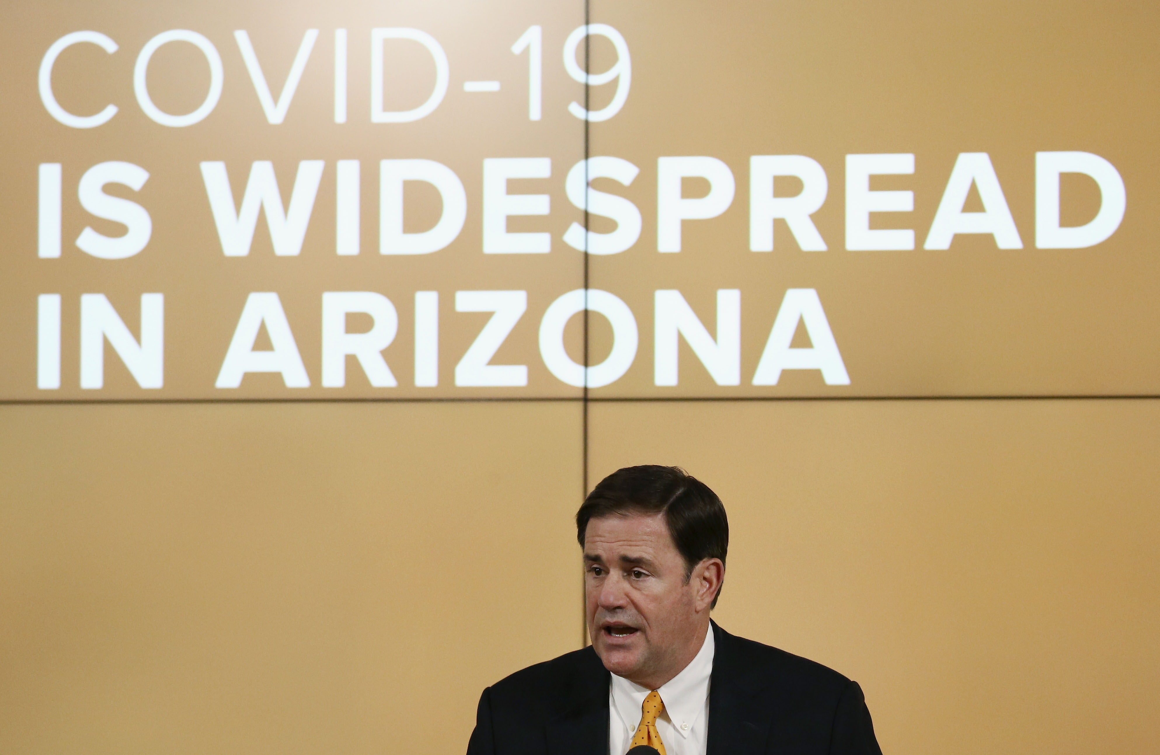 Arizona Gov. Doug Ducey speaks at a news conference in Phoenix on June 25.
