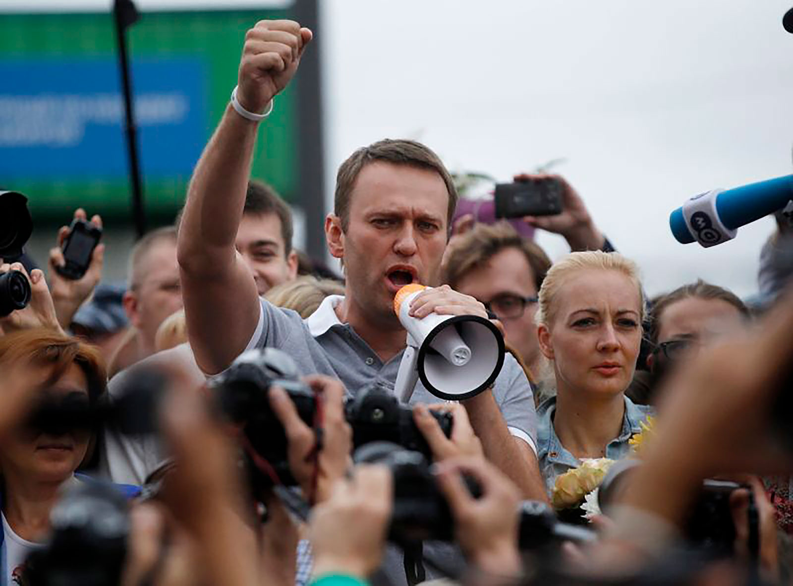 Alexei Navalny, center, addresses supporters and journalists in Moscow in 2013. 