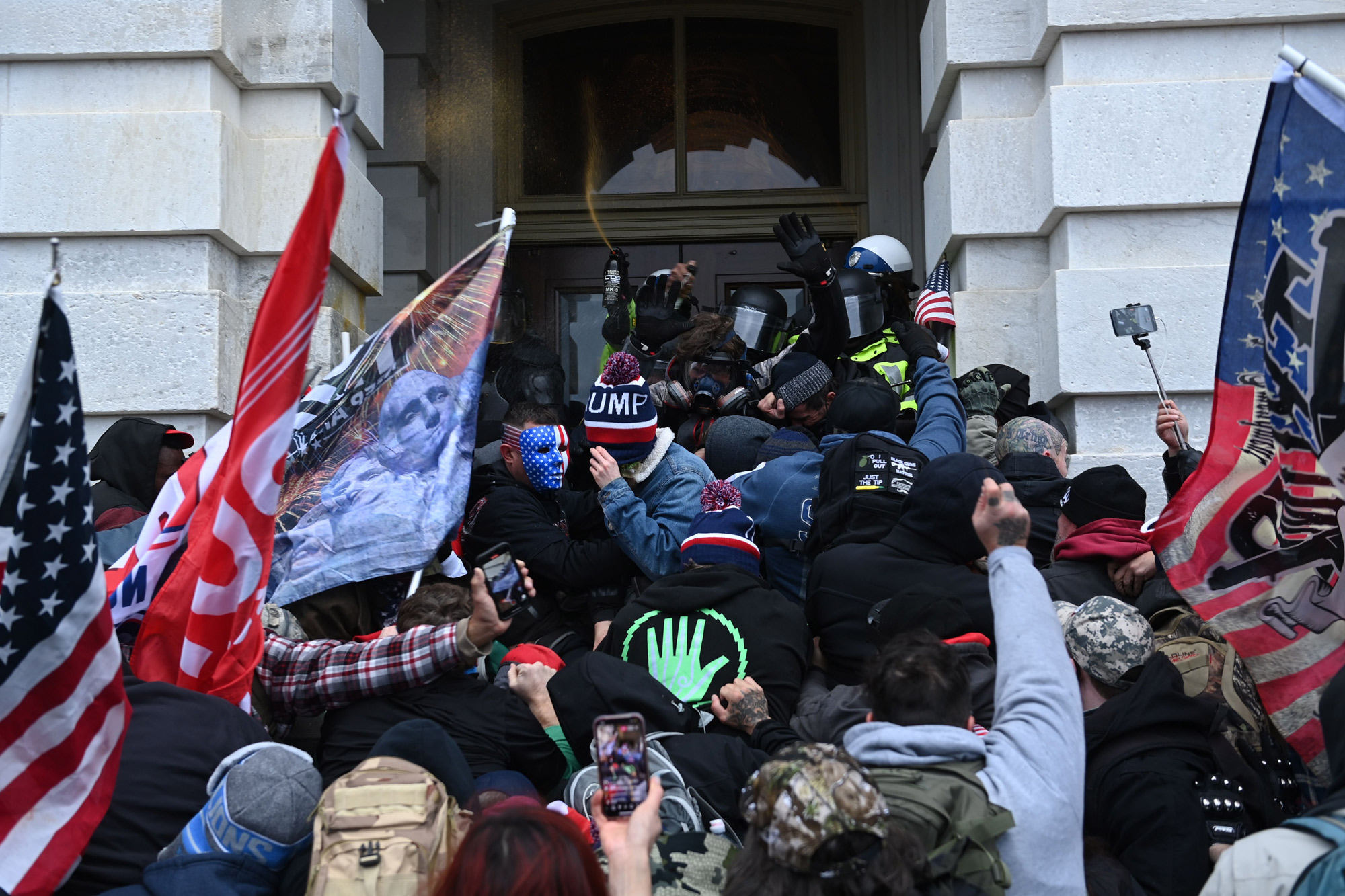 Trump supporters clash with police and security forces as they storm the US Capitol in Washington, DC, on January 6.