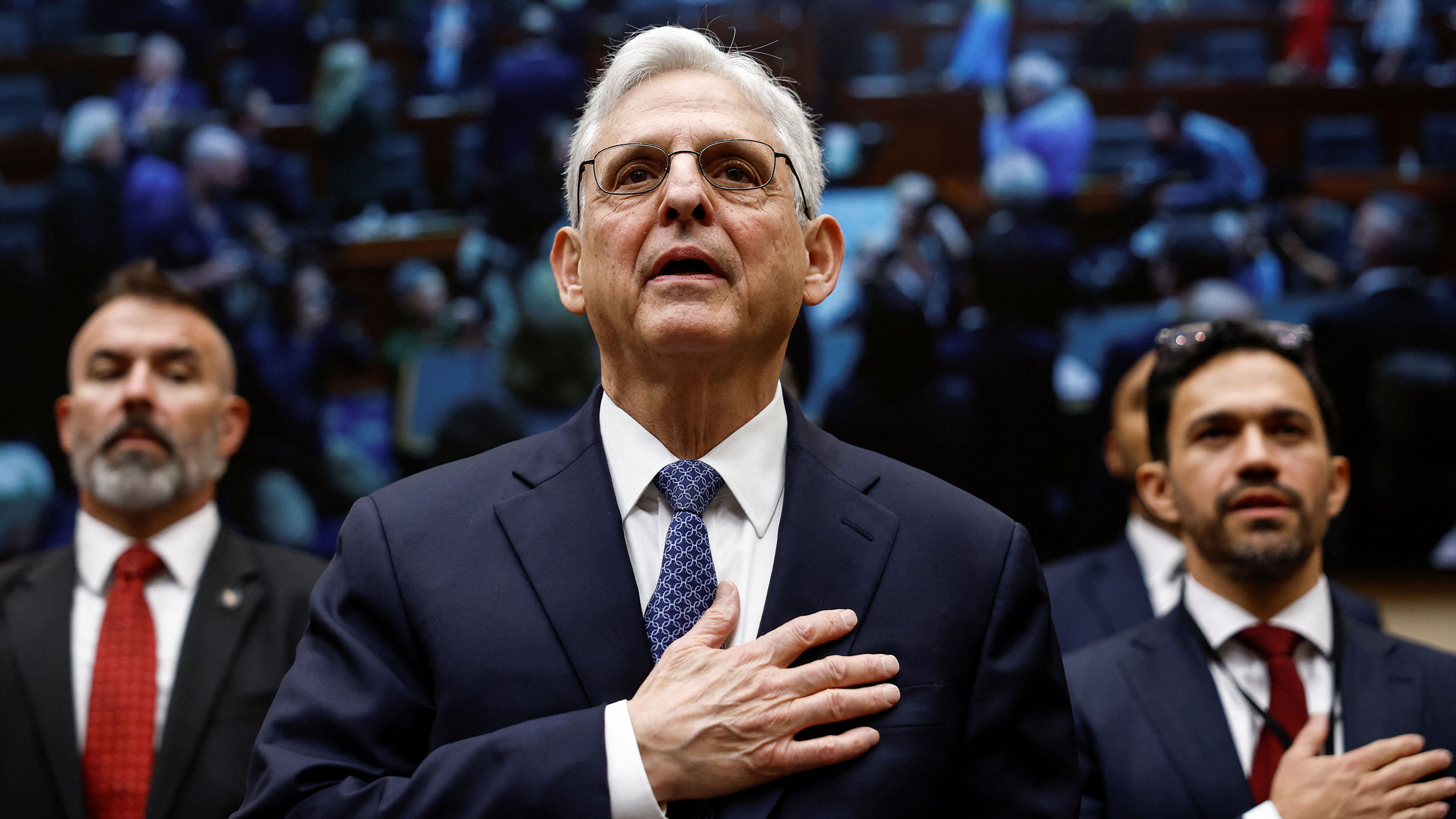 US Attorney General Merrick Garland stands for the Pledge of Allegiance prior to testifying before a House Judiciary Committee hearing on the "Oversight of the U.S. Department of Justice," on Capitol Hill in Washington, DC, on Wednesday.