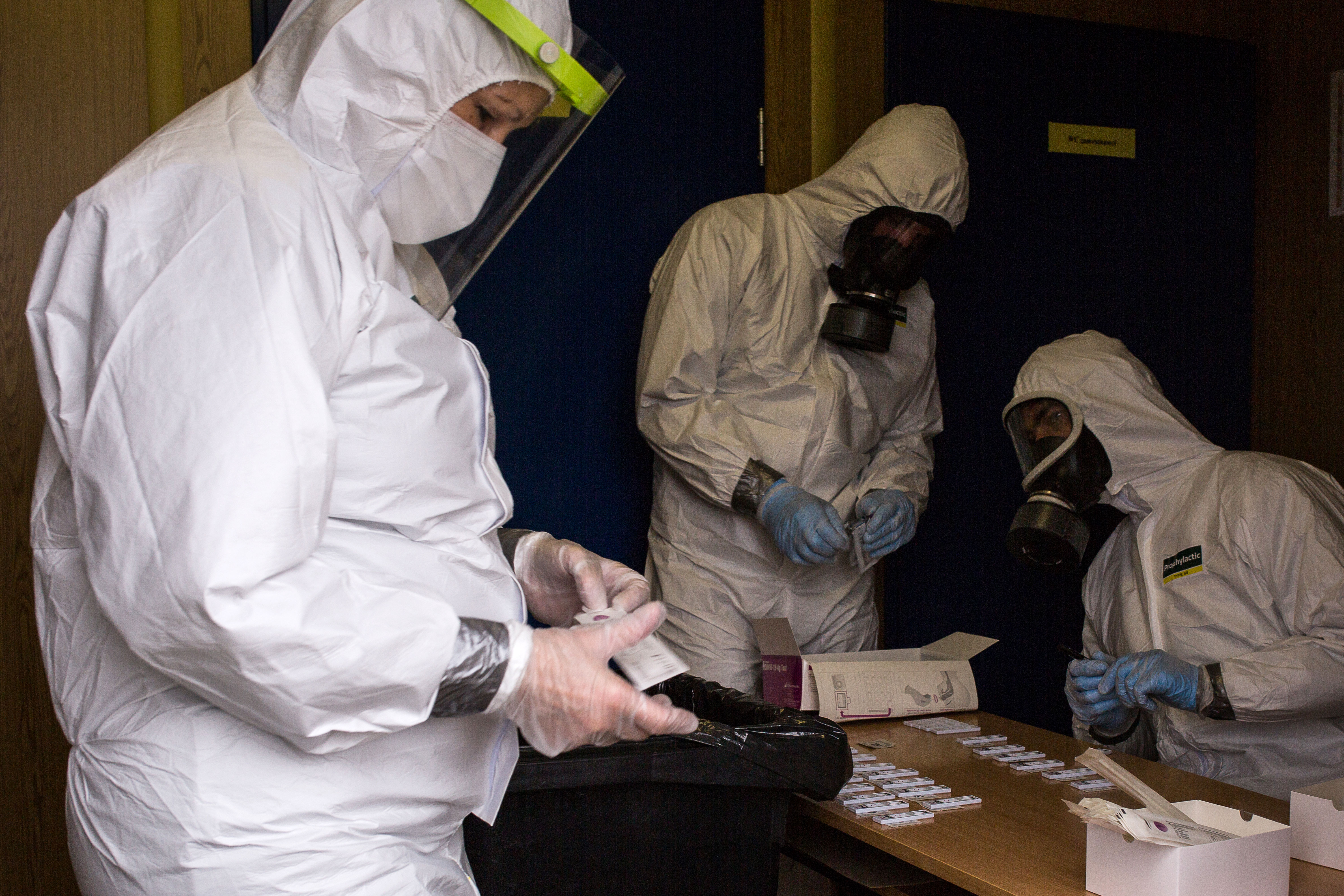 Health workers evaluate Covid-19 antigen tests on November 7 in Prešov, Slovakia.