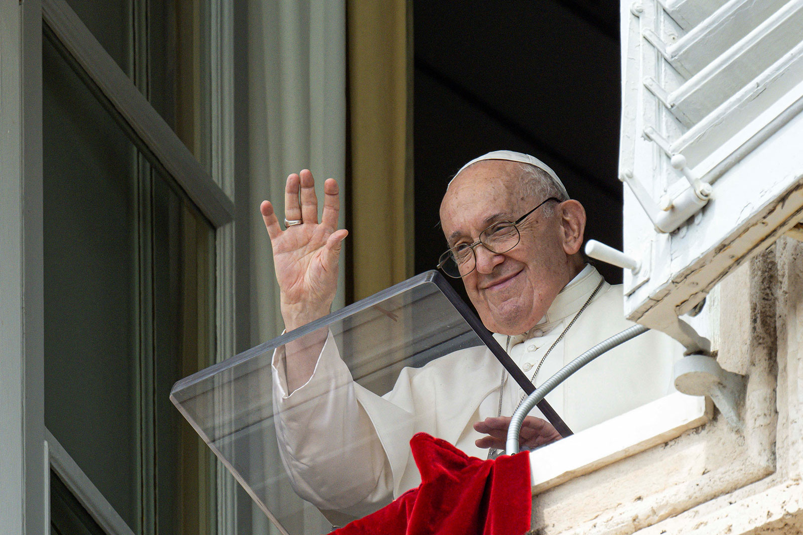 Pope Francis leads the Angelus prayer from his window at the Vatican, on Sunday, August 27, 2023.