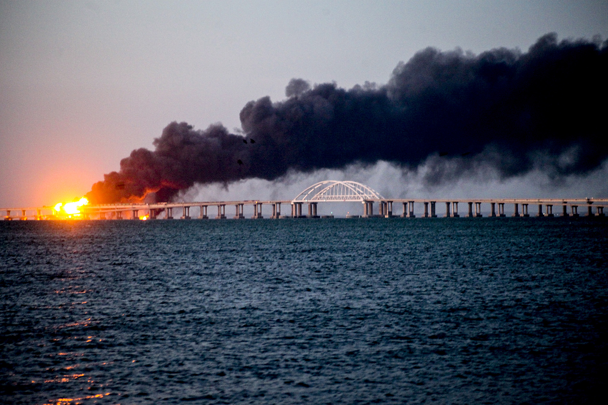 Explosion causes a fire at the Kerch bridge in the Kerch Strait, Crimea, on October 8.