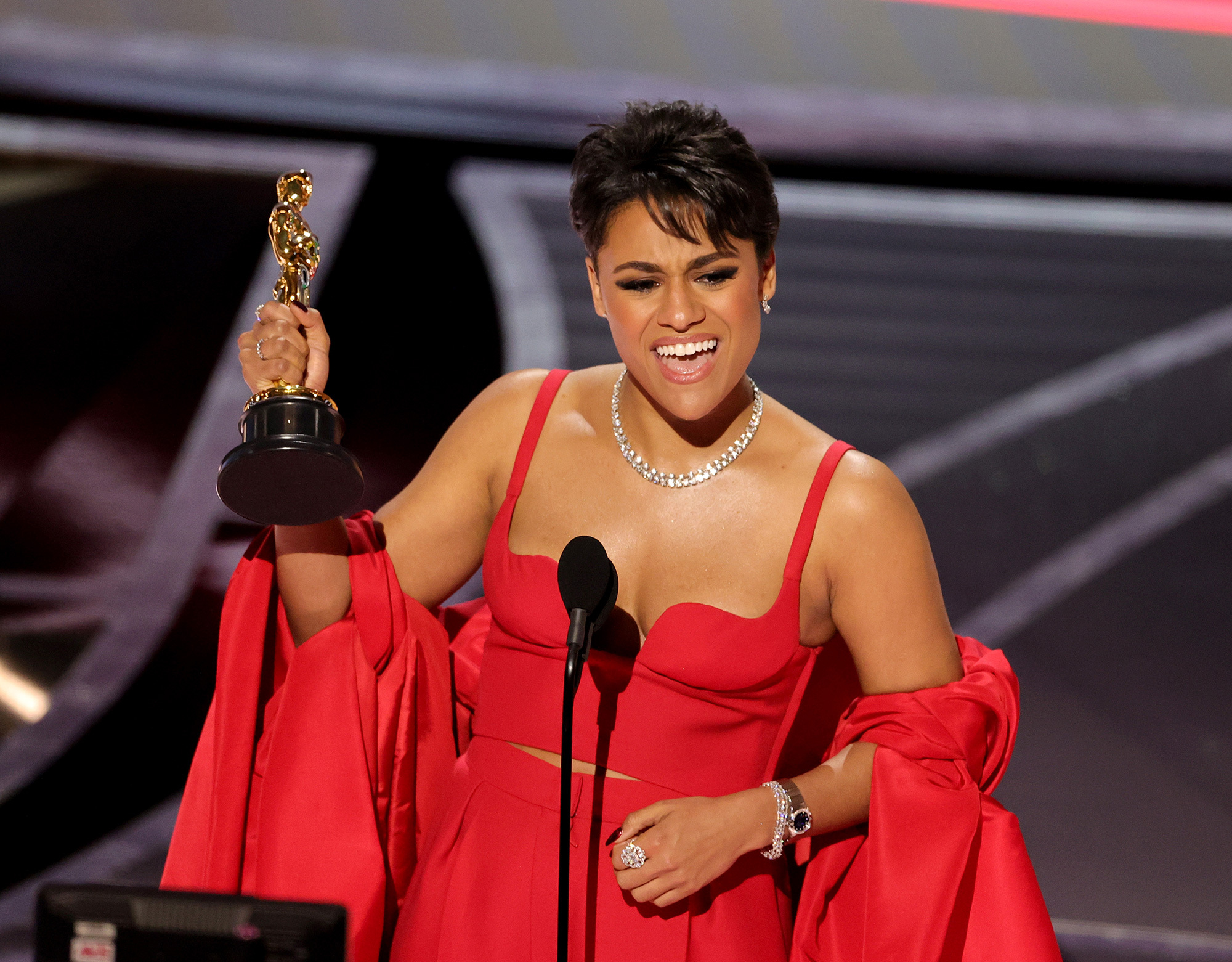 Ariana DeBose accepts her award for best actress in a supporting role for “West Side Story” at the Academy Awards on Sunday. 