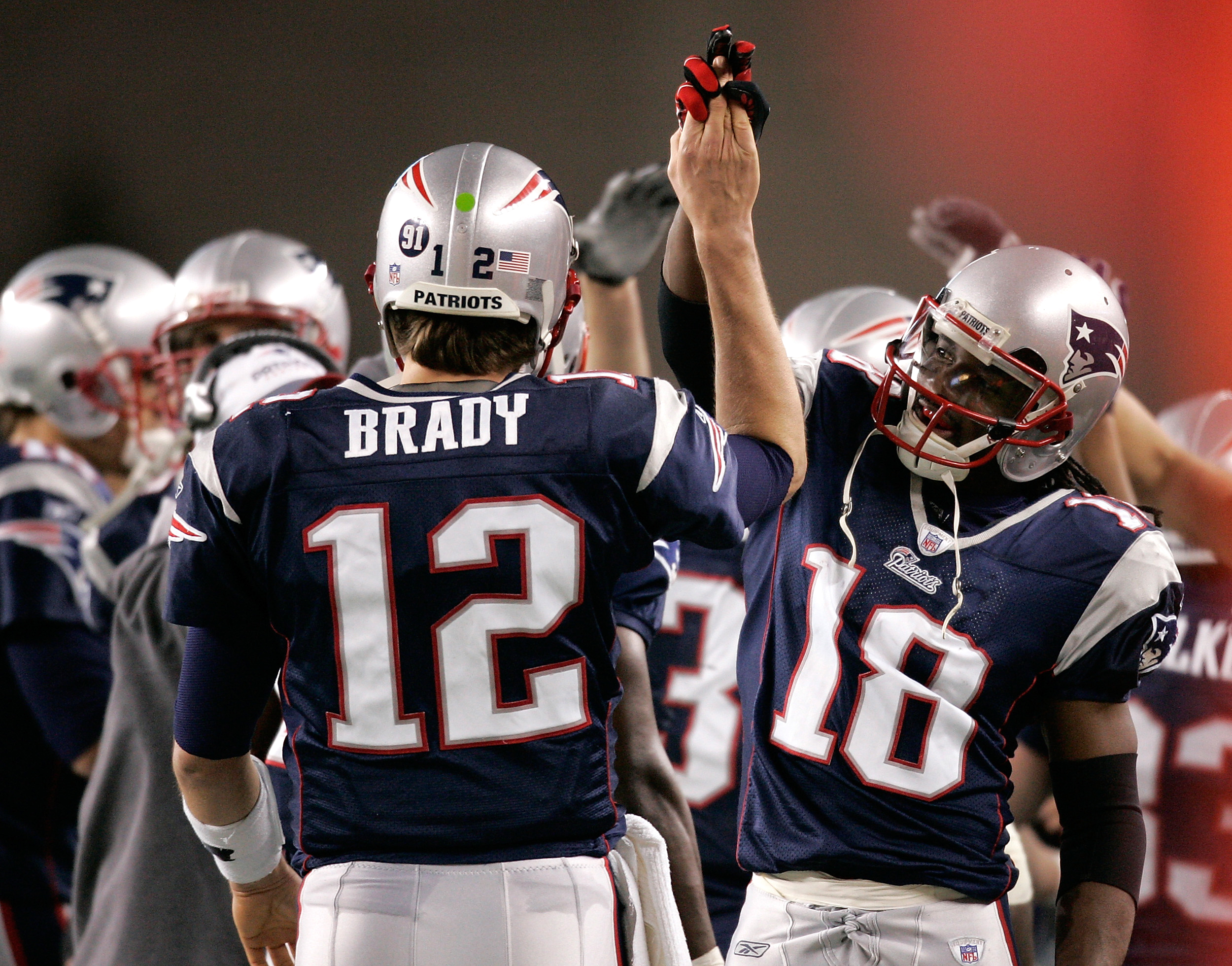 Donté Stallworth celebrates with Tom Brady during a game between the New England Patriots and Jacksonville Jaguars, in 2008. 