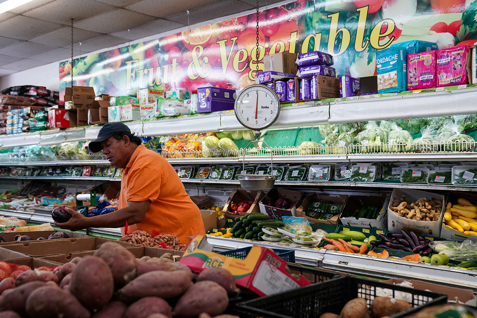 A man shops for produce at a supermarket in Washington, D.C., on August 19.
