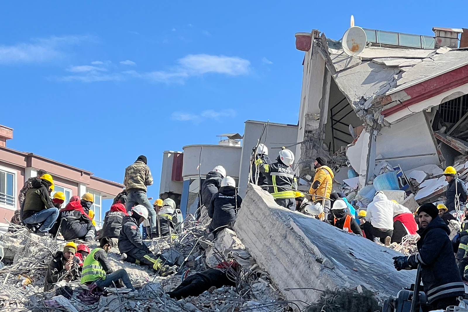 Rescue personnel work near a collapsed building in Gaziantep, Turkey on February 9.