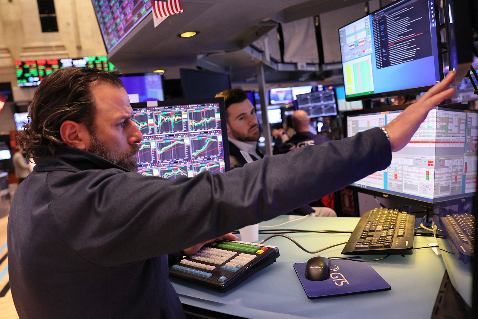 Traders work on the floor of the New York Stock Exchange during afternoon trading on January 9.