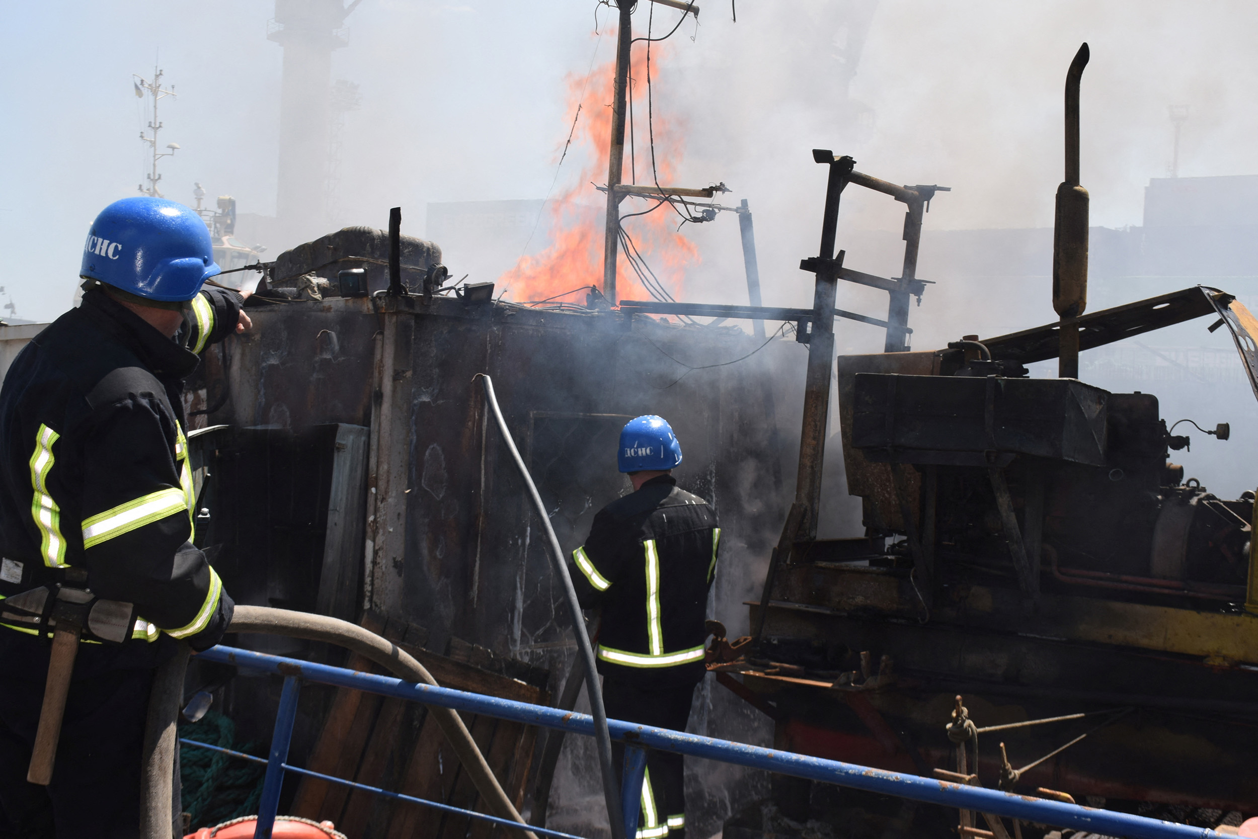 Firefighters work at the site of a Russian missile attack on the seaport of Odessa, Ukraine, on July 23.