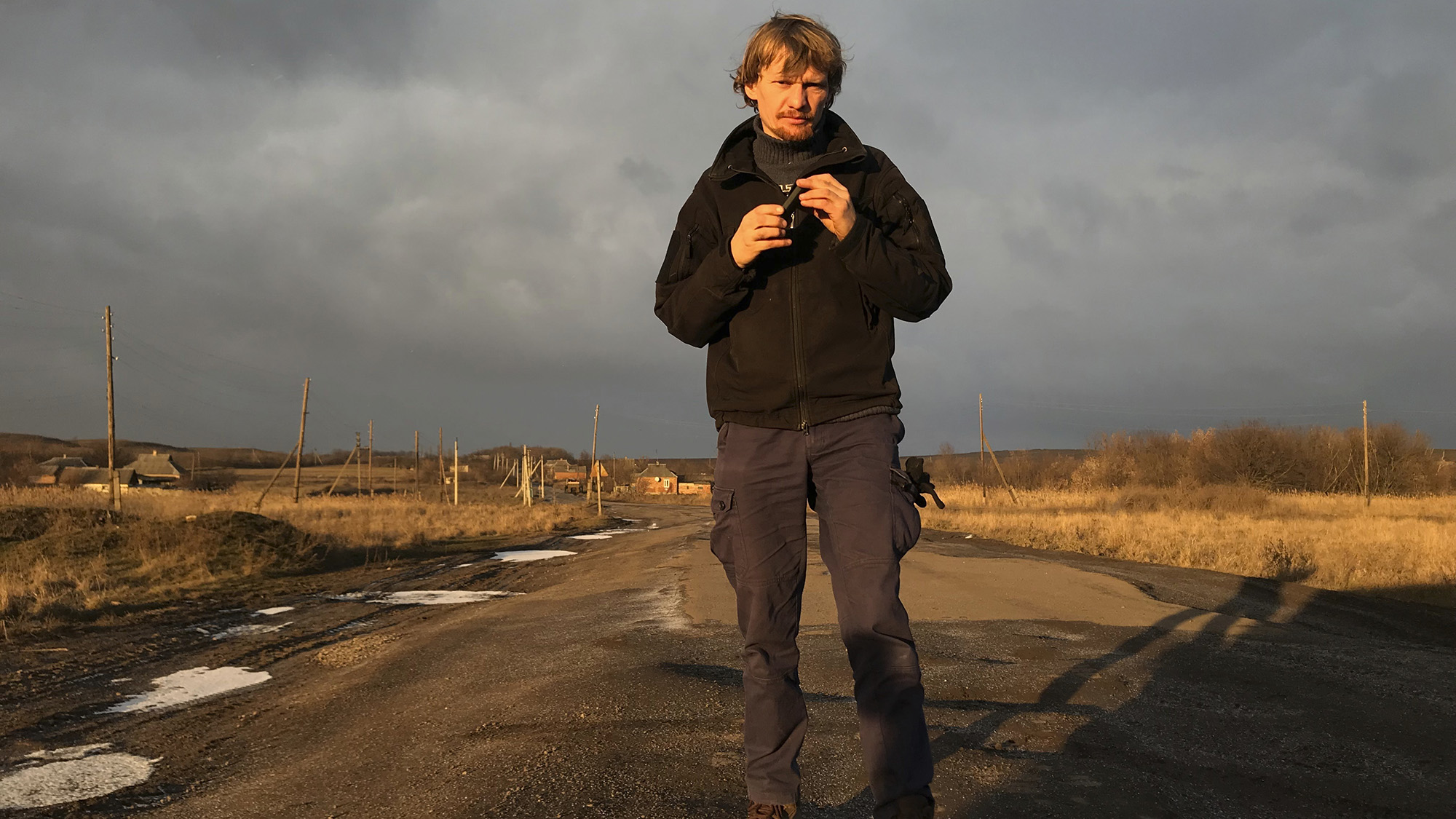 Ukrainian photojournalist Max Levin poses for a photo in the Donetsk region in Ukraine on Jan. 12, 2018. The UNIAN news agency reported Tuesday March 22, that Levin has been unaccounted since March 13.