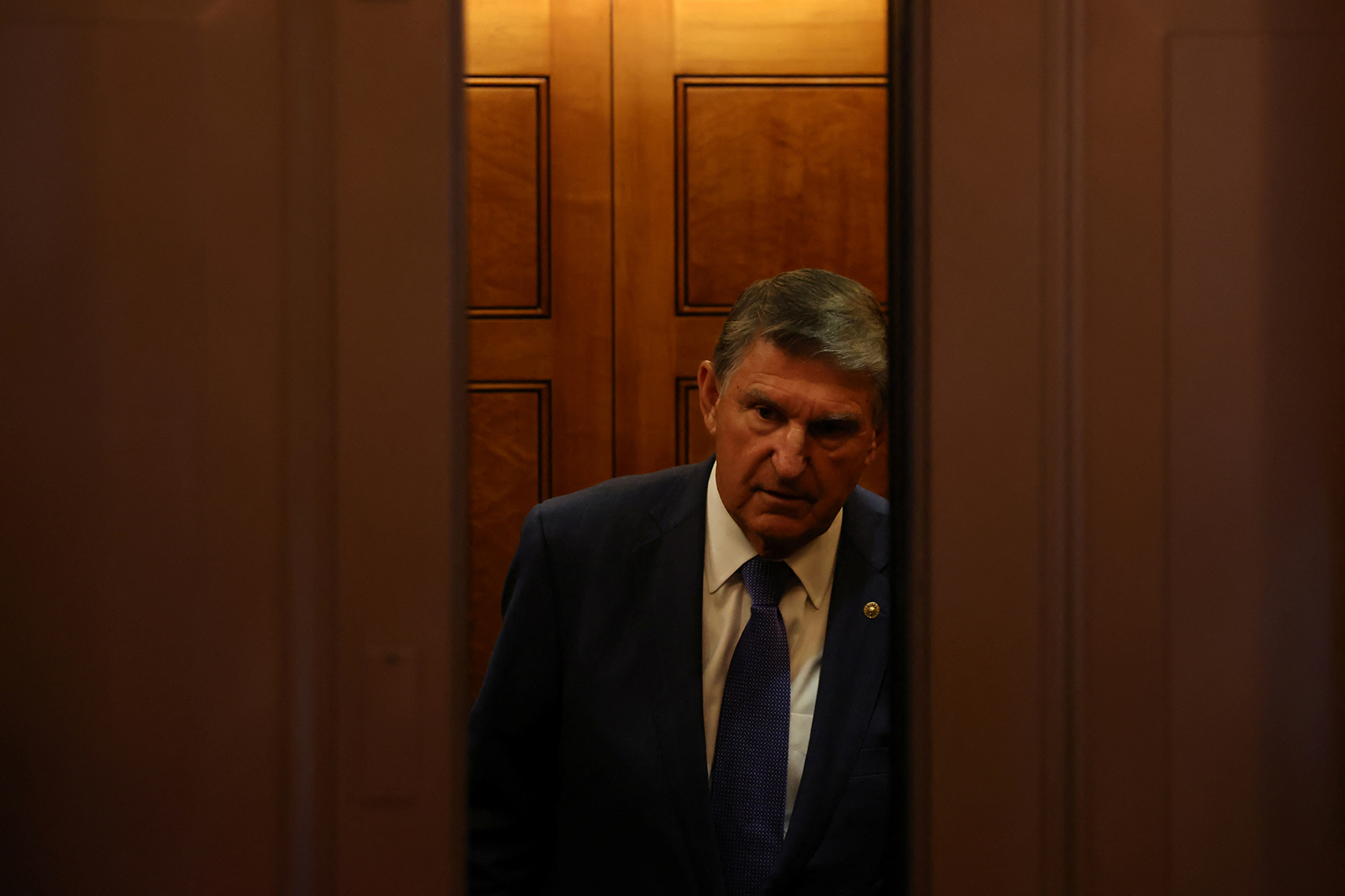 U.S. Senator Joe Manchin (D-WV) rides an elevator after leaving the Senate floor amid ongoing talks over government funding, as the threat of an October government shutdown looms on Capitol Hill, in Washington, on September 6.