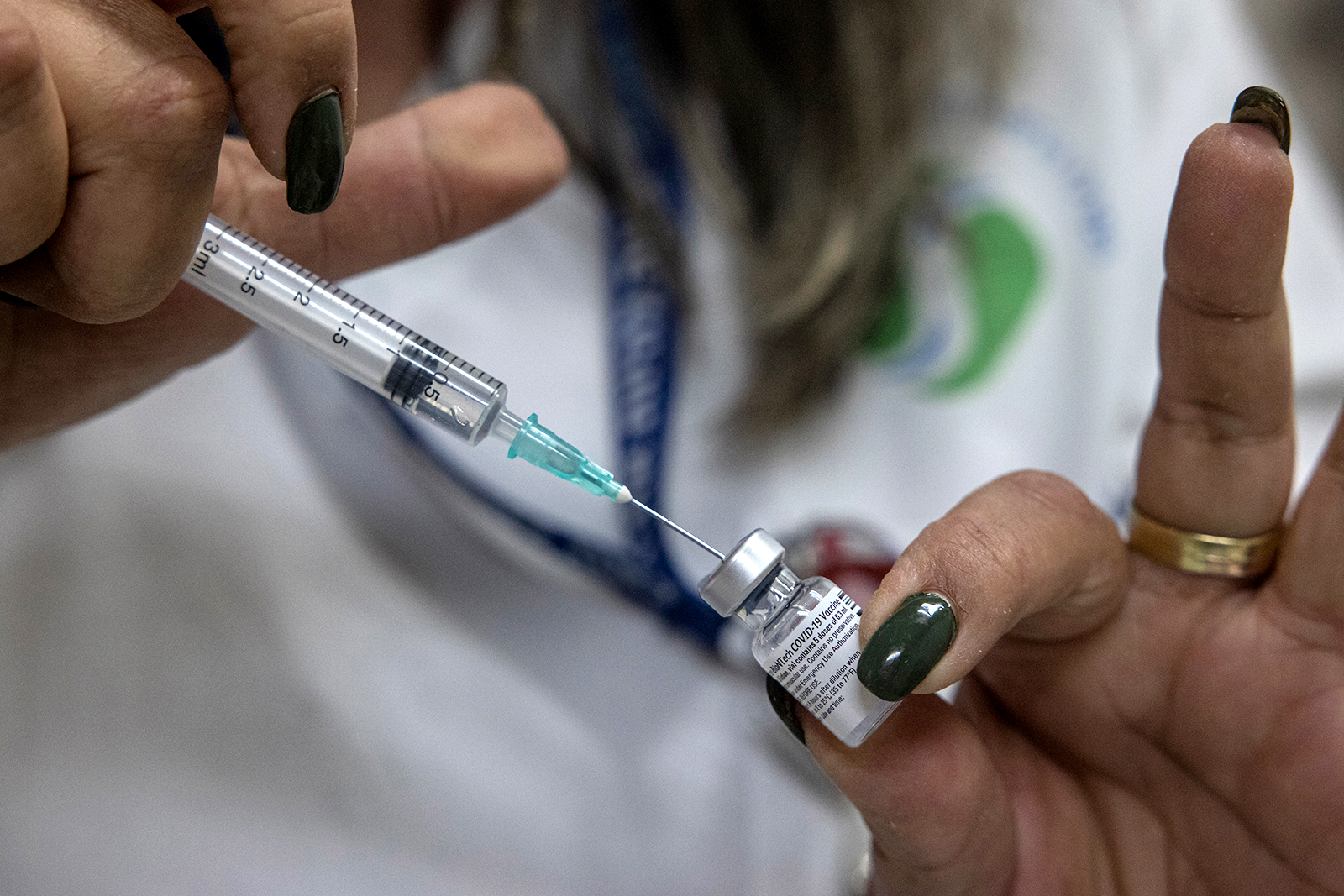 A nurse prepares a Pfizer Covid-19 vaccine in Beersheba, Israel, on December 29, 2020.