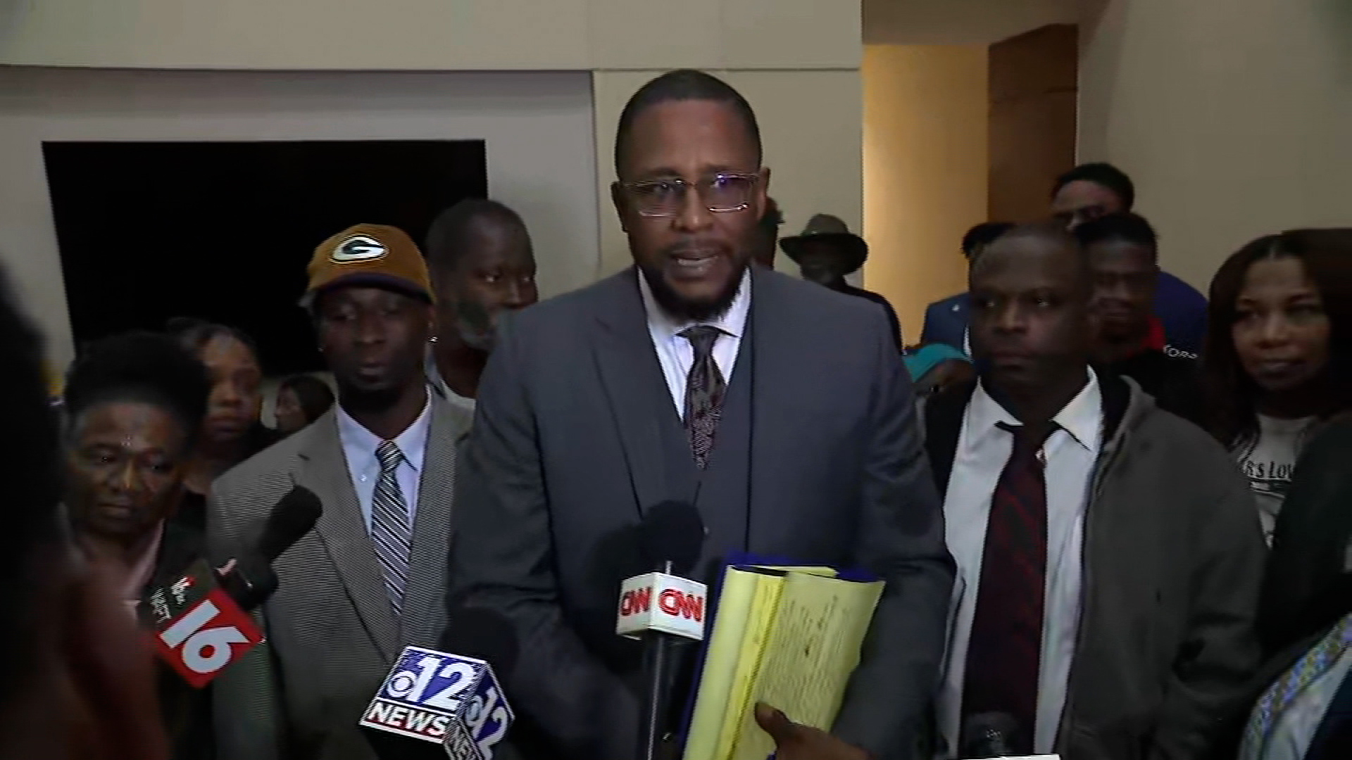 Attorney Malik Shabazz, center, speaks alongside Michael Jenkins and Eddie Parker following the sentencing of the former Mississippi law enforcement officers on Wednesday in Brandon, Mississippi. 