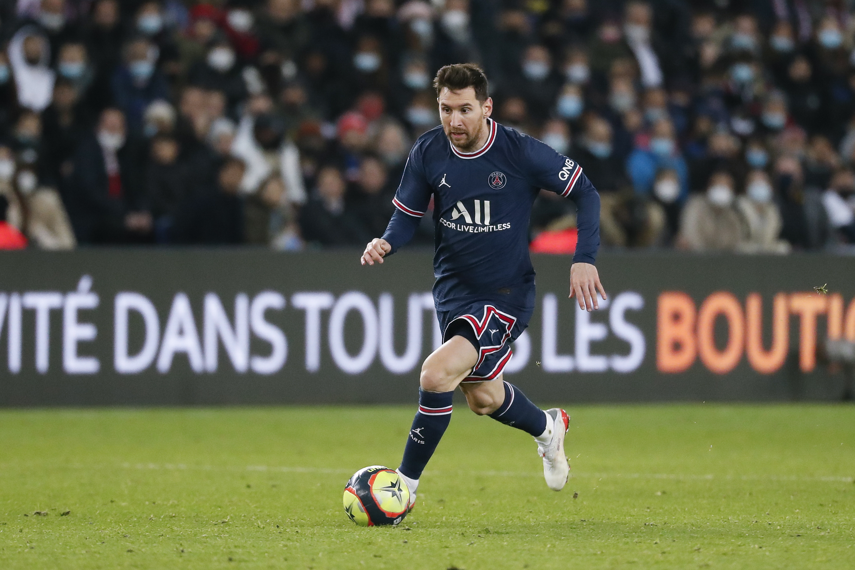 Lionel Messi #30 of Paris Saint-Germain controls the ball during the Ligue 1 Uber Eats match between Paris Saint Germain and AS Monaco at Parc des Princes on December 12, 2021 in Paris, France. 