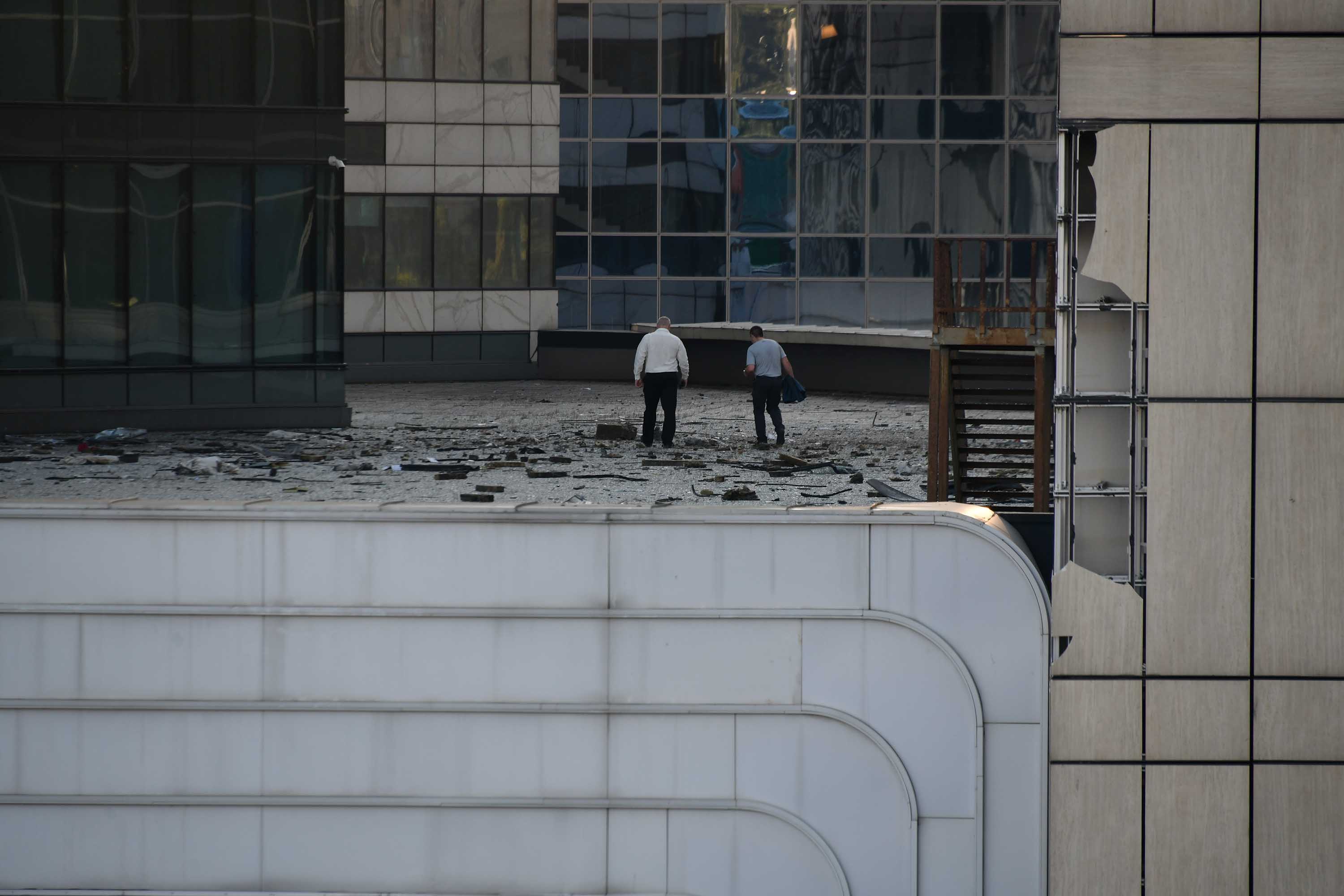 Security forces inspect the scene of a drone attack on August 1, after a building in Moscow was targeted for the second time in two days. 