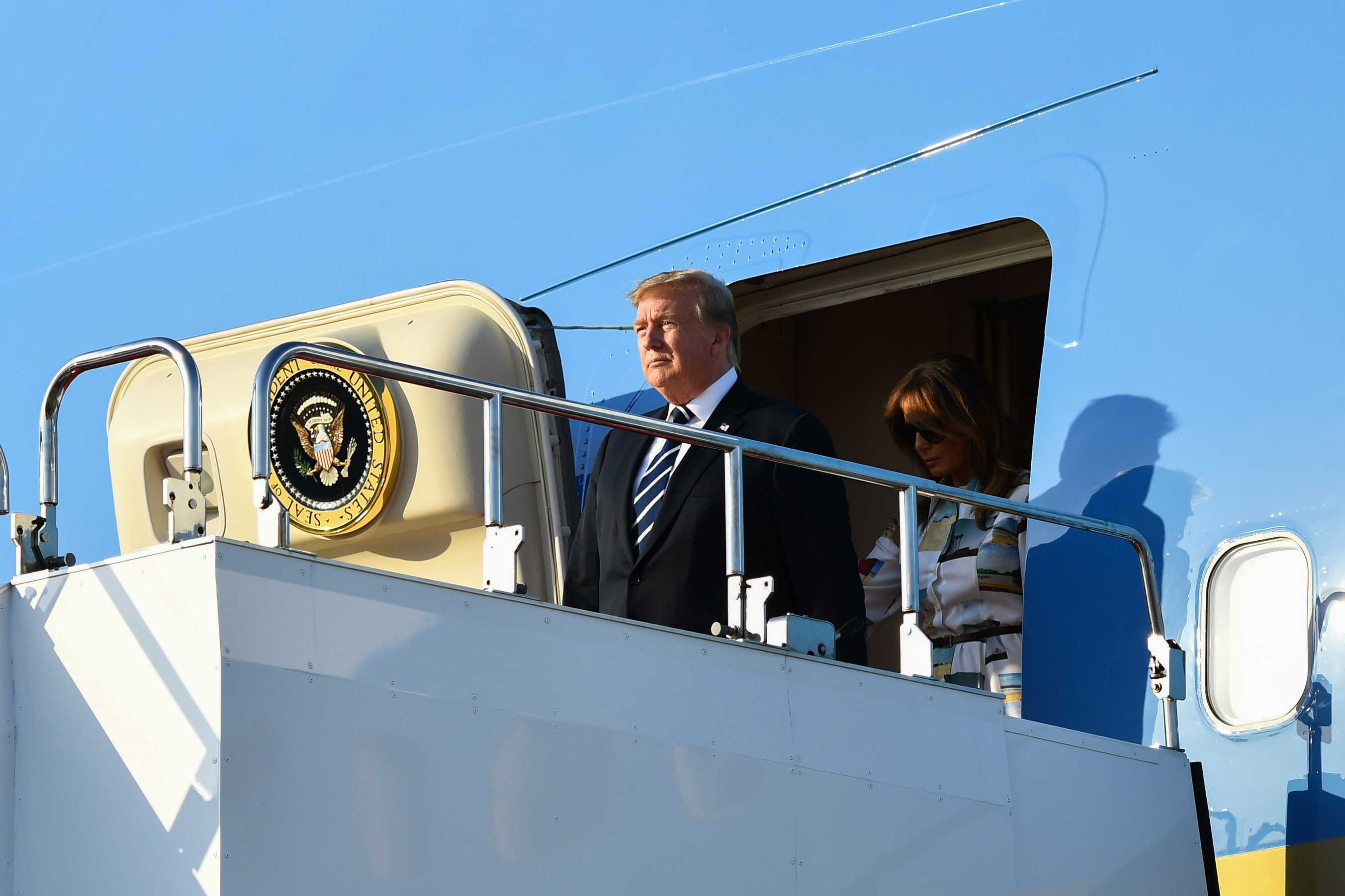 US President Donald Trump disembarking from Air Force One.