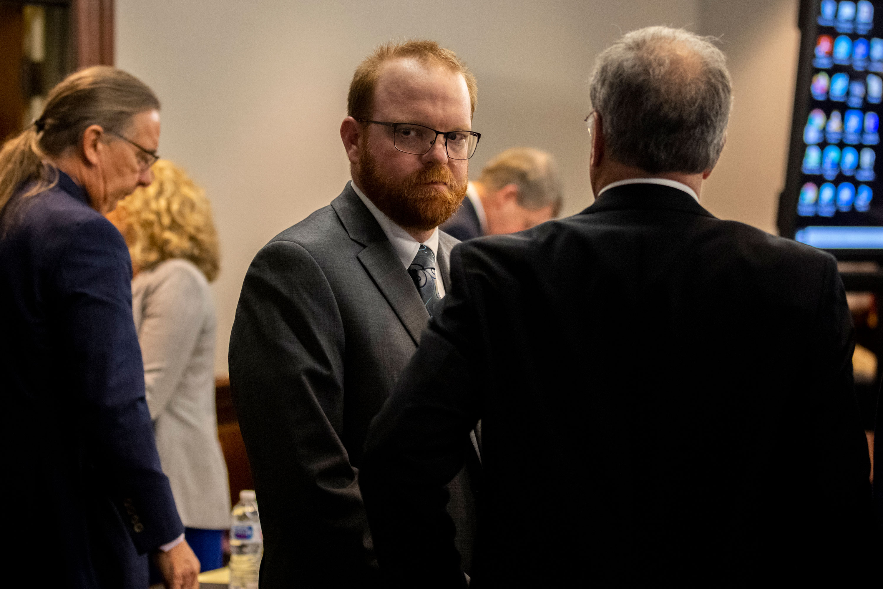 Travis McMichael looks back at his mother and sister in the courtroom after the jury convicted him for the murder of Ahmaud Arbery on Wednesday.
