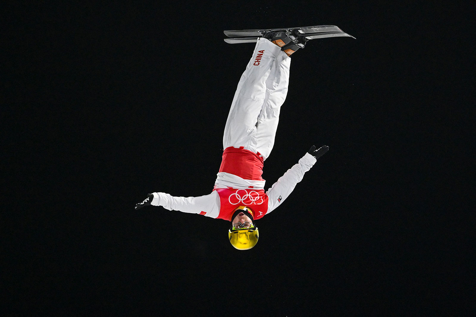 China's Qi Guangpu competes in the freestyle skiing aerials on February 16.