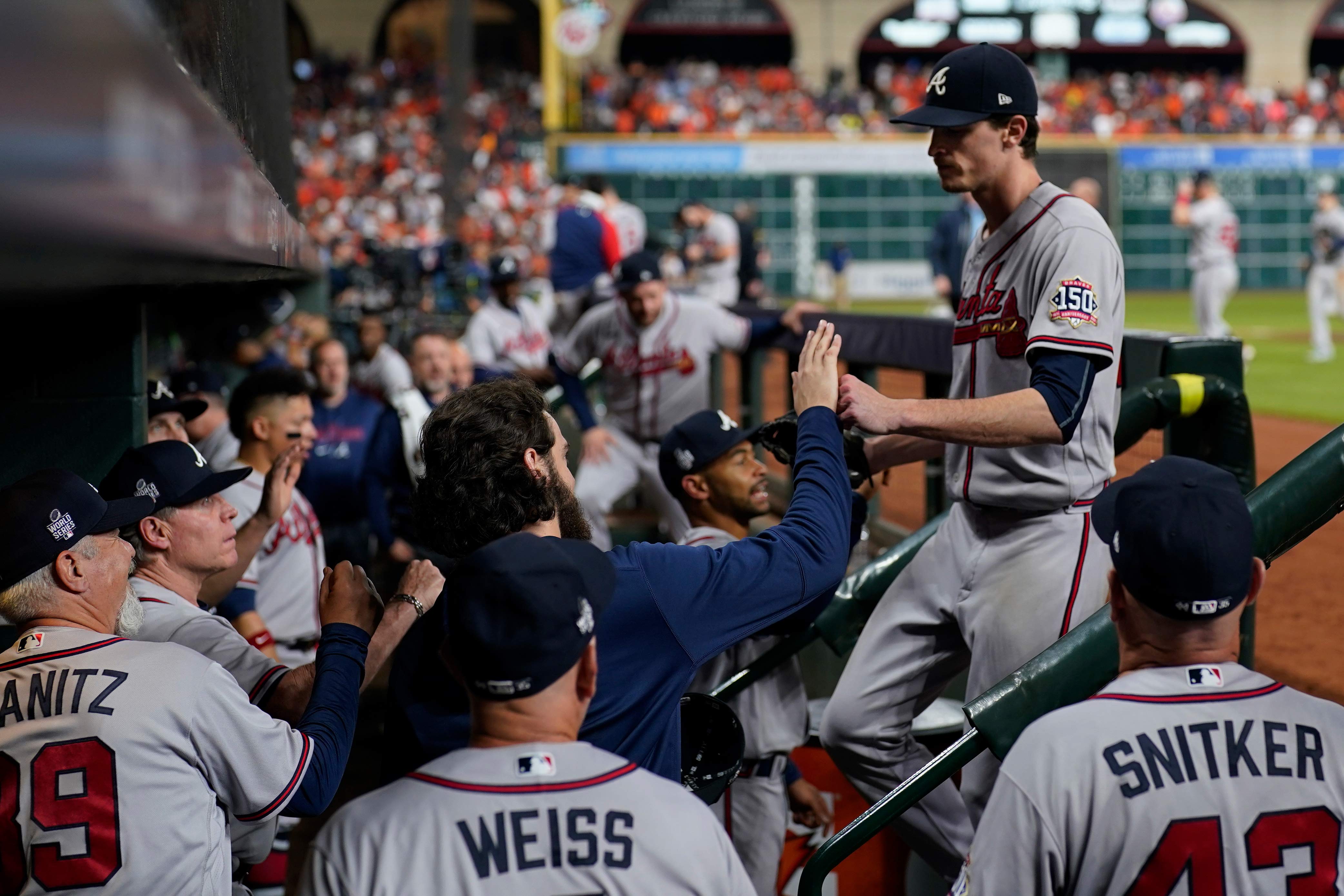 Braves starting pitcher Max Fried walks into the dugout after the sixth inning in Game 6.