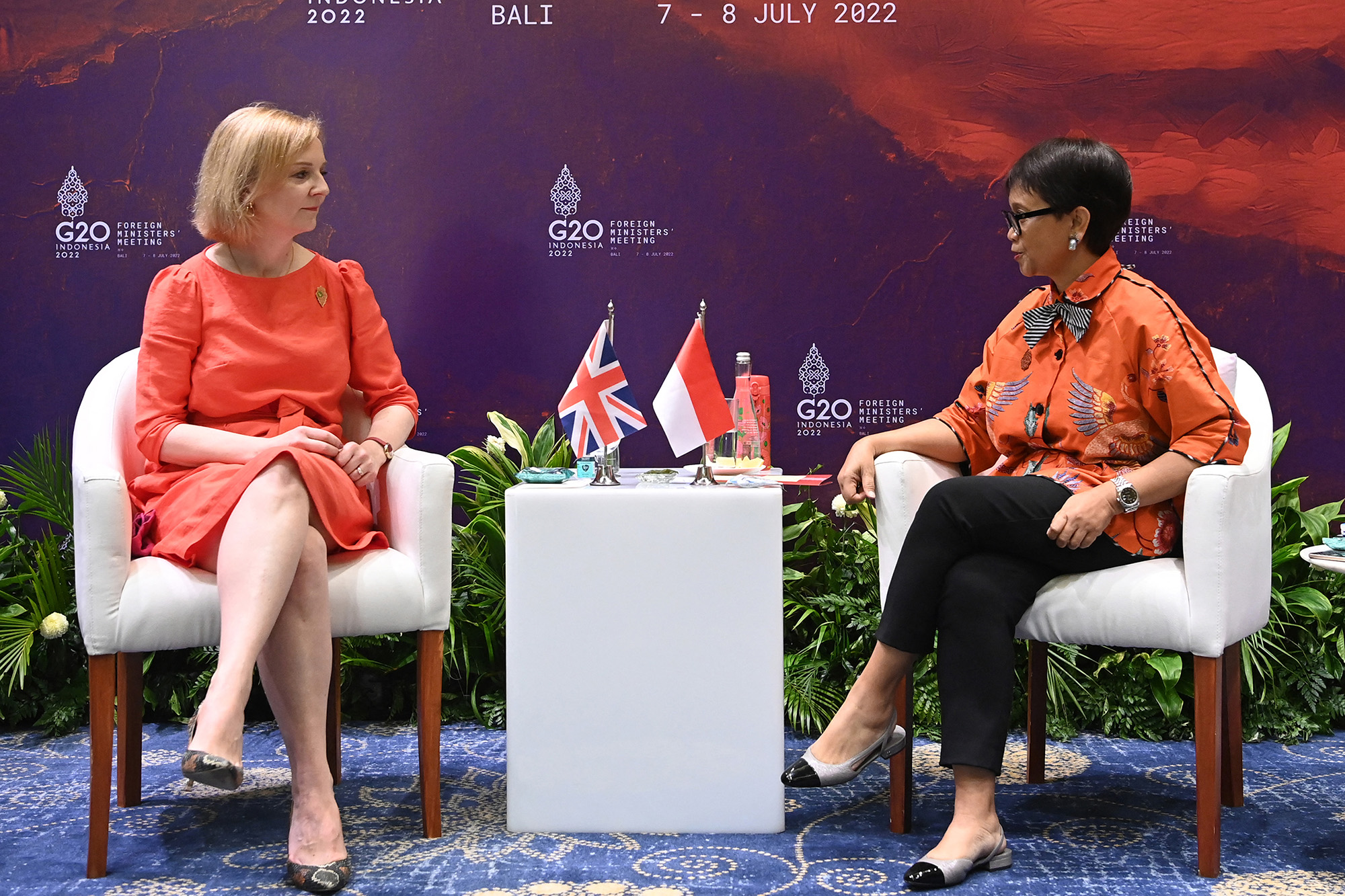Indonesia's Foreign Minister Retno Marsudi, right, speaks with Britain's Foreign Secretary Liz Truss, left, during their bilateral meeting at the G20 Foreign Ministers' Meeting in Nusa Dua on the Indonesian resort island of Bali on July 7.