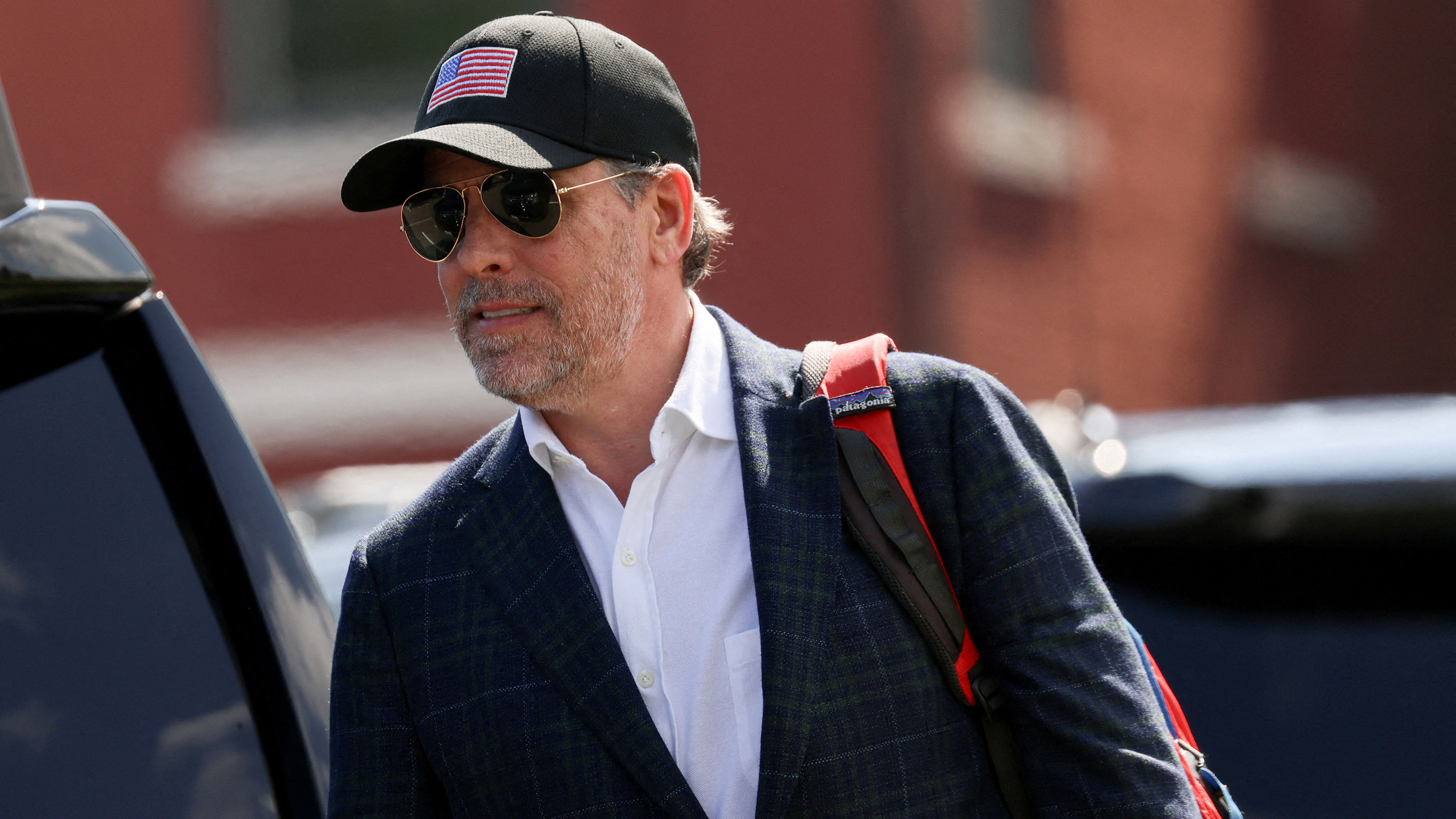 Hunter Biden walks to the motorcade after arriving at Fort McNair, after President Joe Biden spent the weekend at Camp David, in Washington, DC, on July 4, 2023.