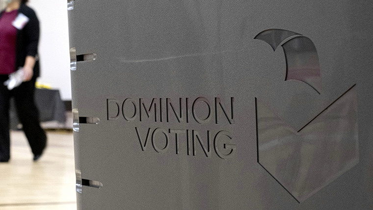 A Dominion Voting ballot scanner is seen at a polling location at an elementary school outside of Atlanta, GA, in January 2021.