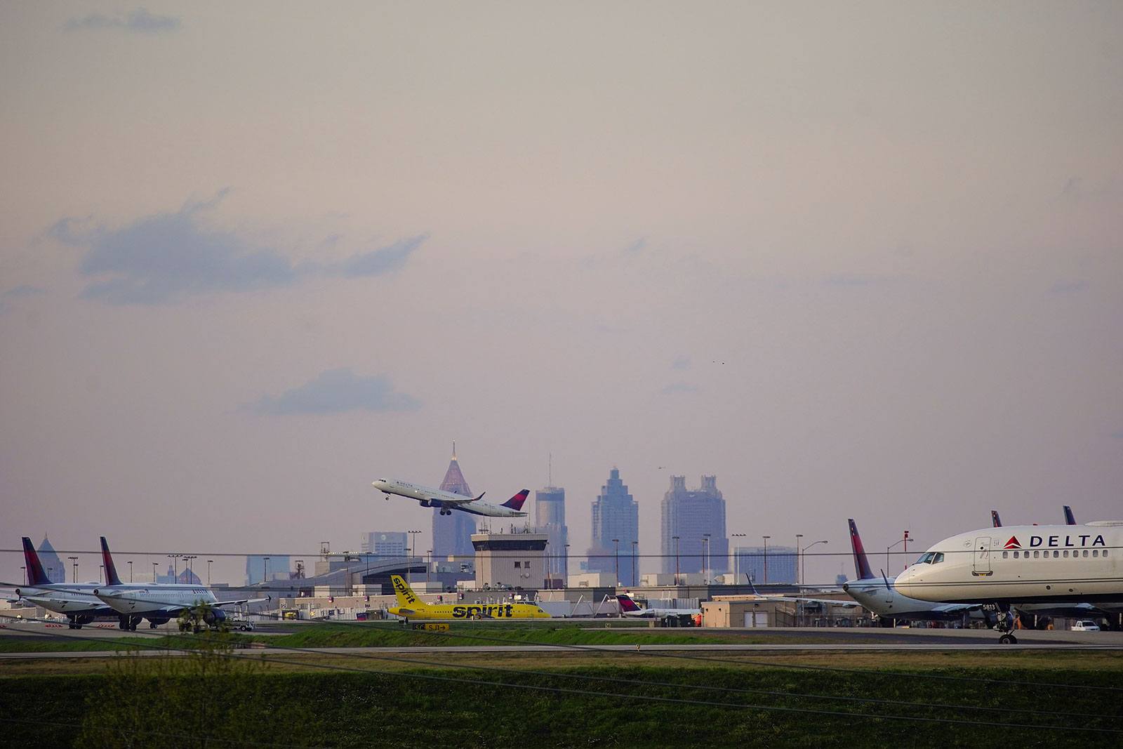 Planes take off from Atlanta Hartsfield-Jackson International Airport.