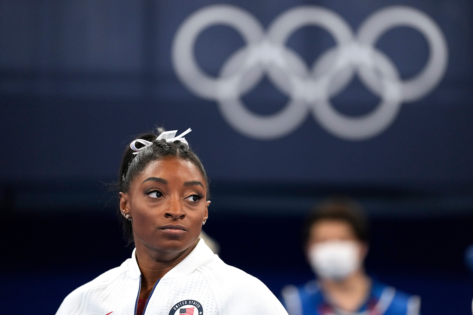 American gymnast Simone Biles watches the action after she exited the team final on Tuesday. 