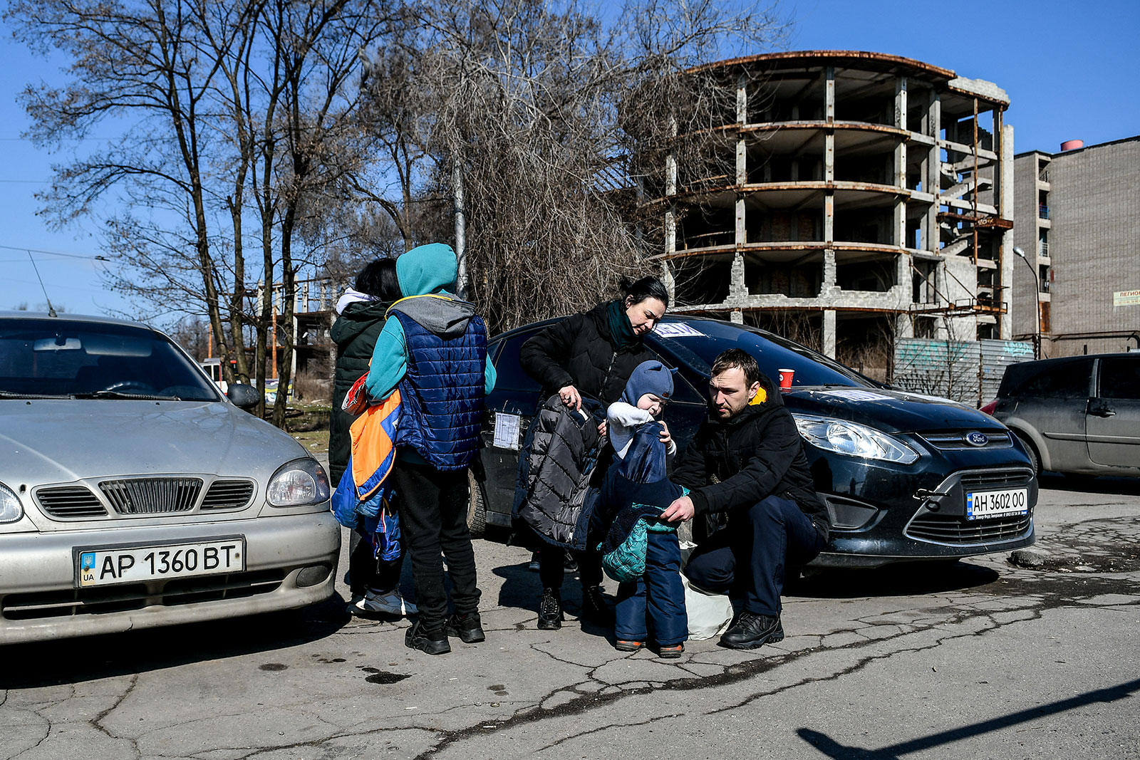 Civilians who were evacuated from Mariupol gather in the southeastern city of Zaporizhia on March 15.