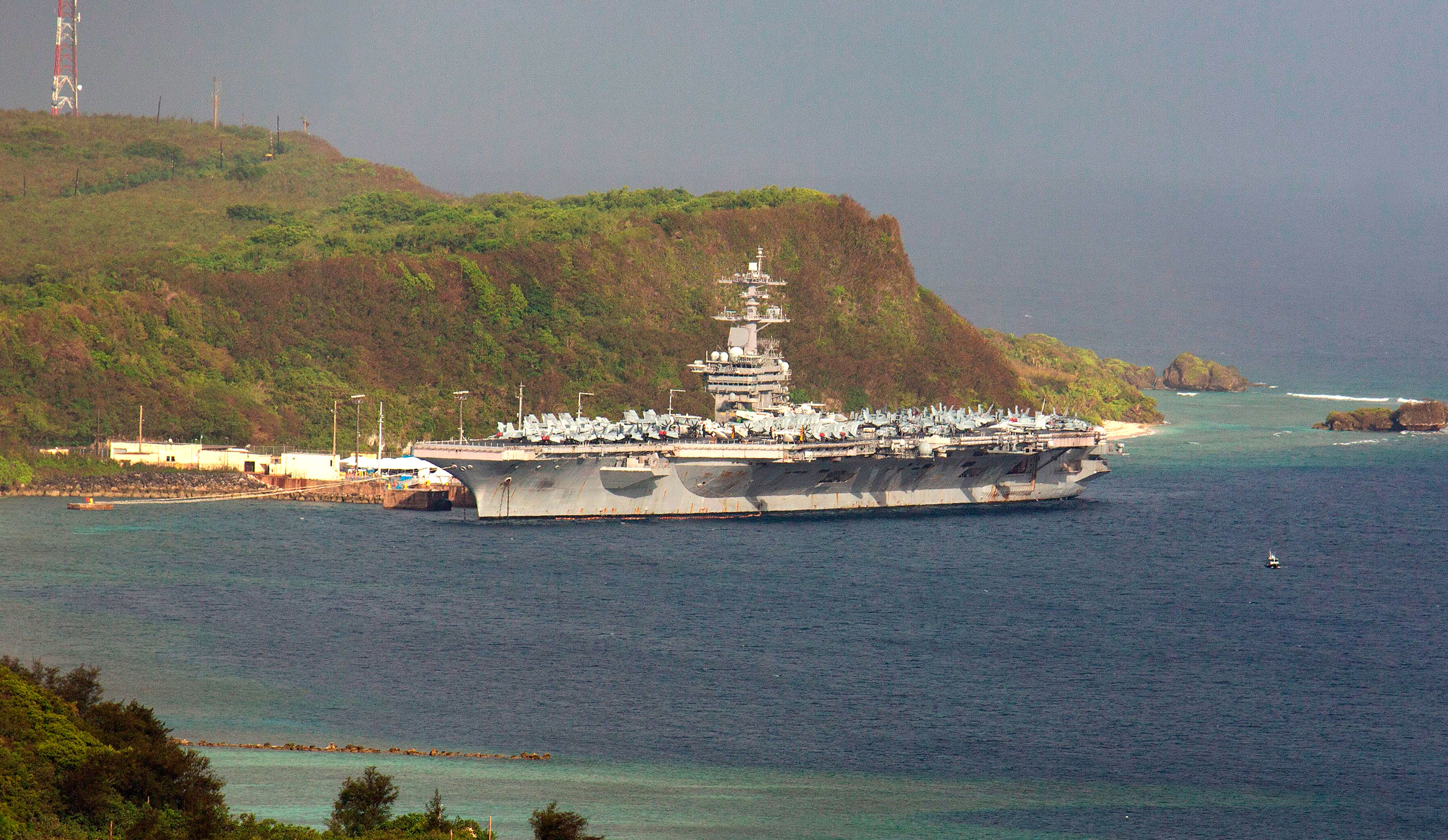 The aircraft carrier USS Theodore Roosevelt, docked at Naval Base Guam on April 27.