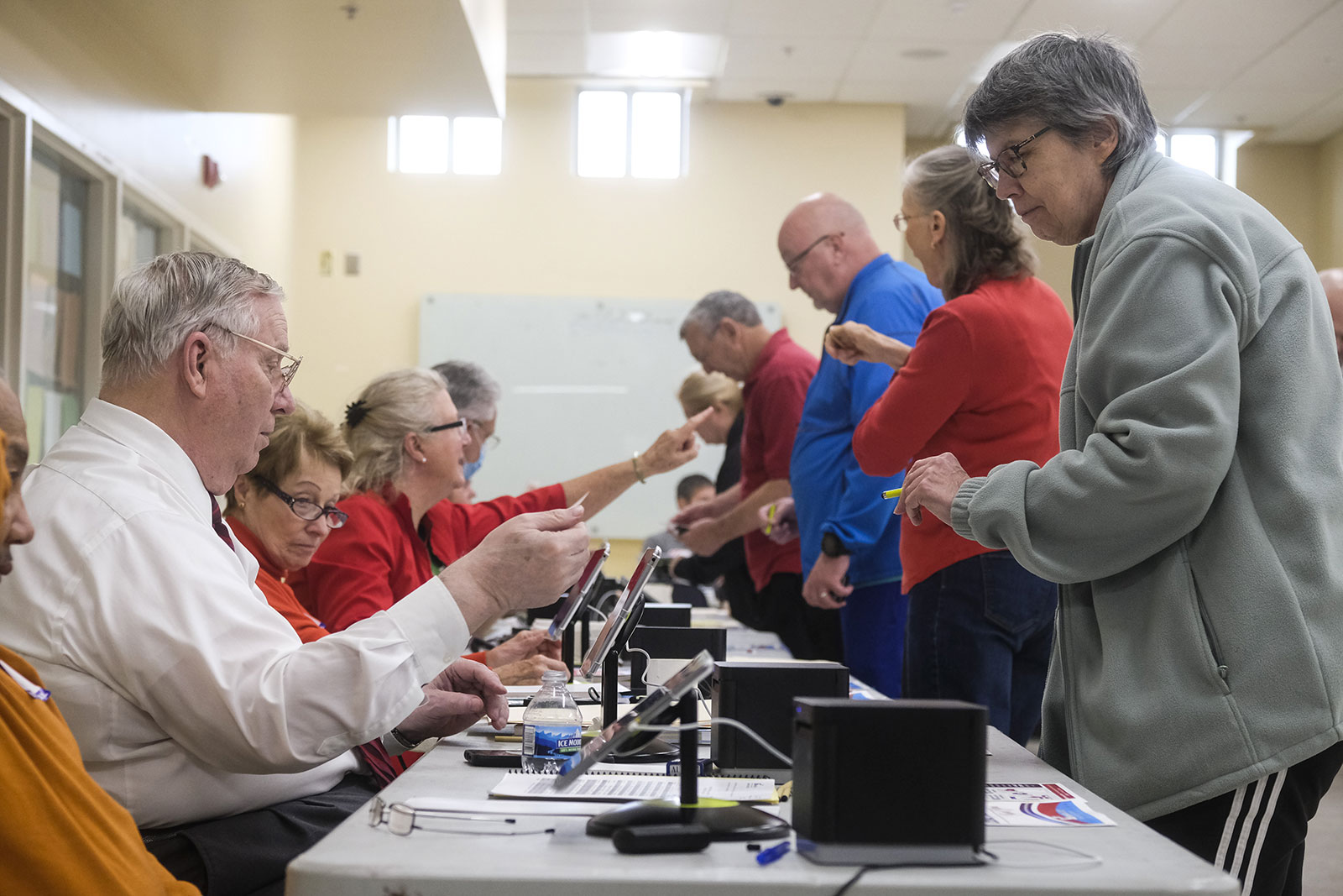 Election officials check-in at a polling location in Columbus, Ohio, on Tuesday, May 3.