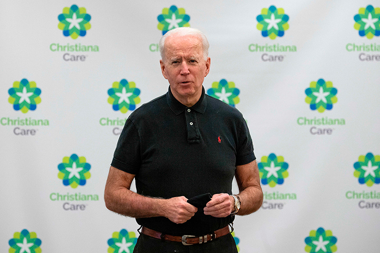 US President-elect Joe Biden speaks after receiving the second course of the Pfizer-BioNTech Covid-19 vaccine on January 11, 2021 at Christiana Hospital in Newark, Delaware, administered by Chief Nurse Executive Ric Cuming. (Photo by JIM WATSON / AFP) (Photo by JIM WATSON/AFP via Getty Images)