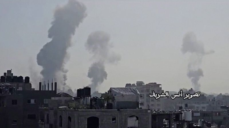 In this still from video obtained by Reuters, smoke fills the air in Jabalya, Gaza, on December 3.