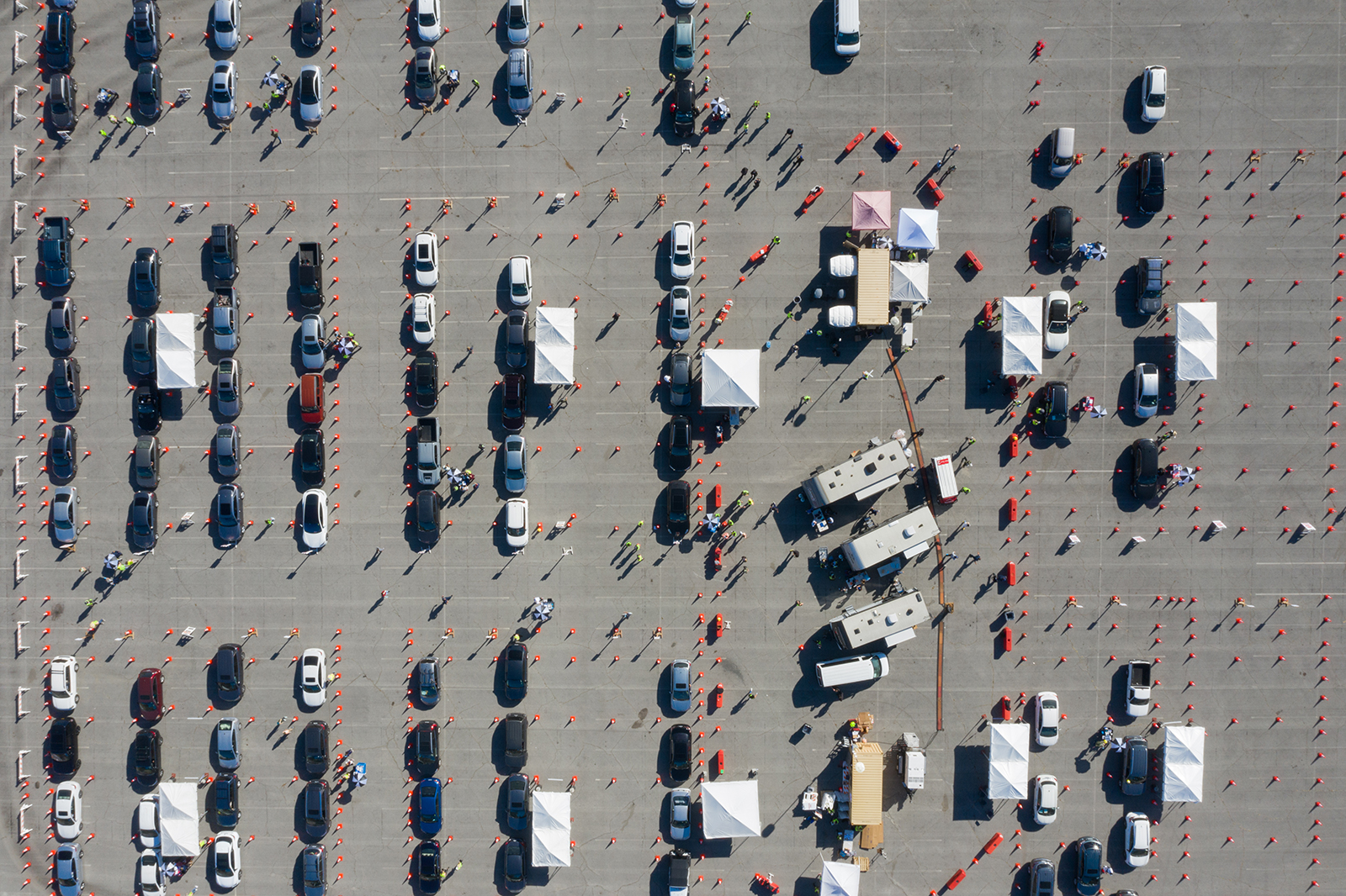 People wait in vehicles at a Covid-19 vaccination site in the Dodger Stadium parking lot in Los Angeles, on January 15.