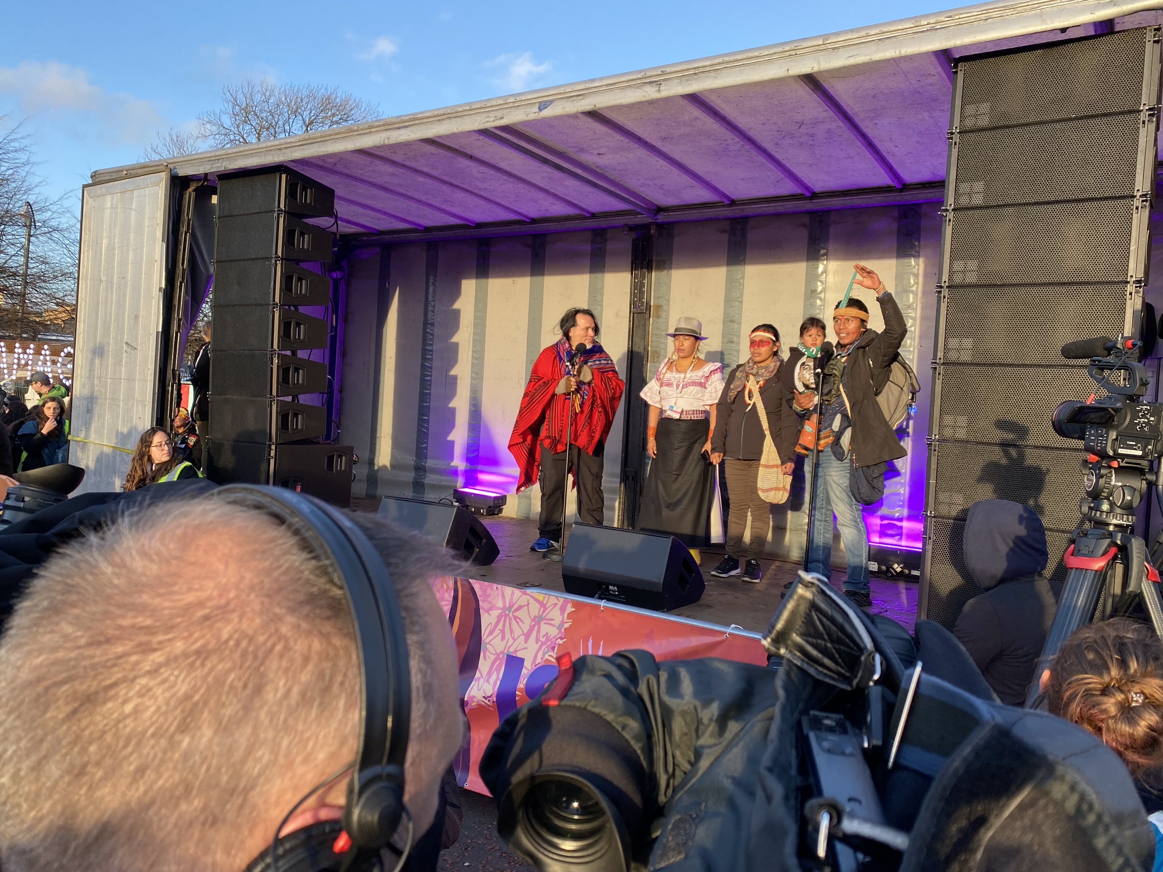 Members of Minga Indigena address a crowd of climate activists on Saturday in Glasgow.