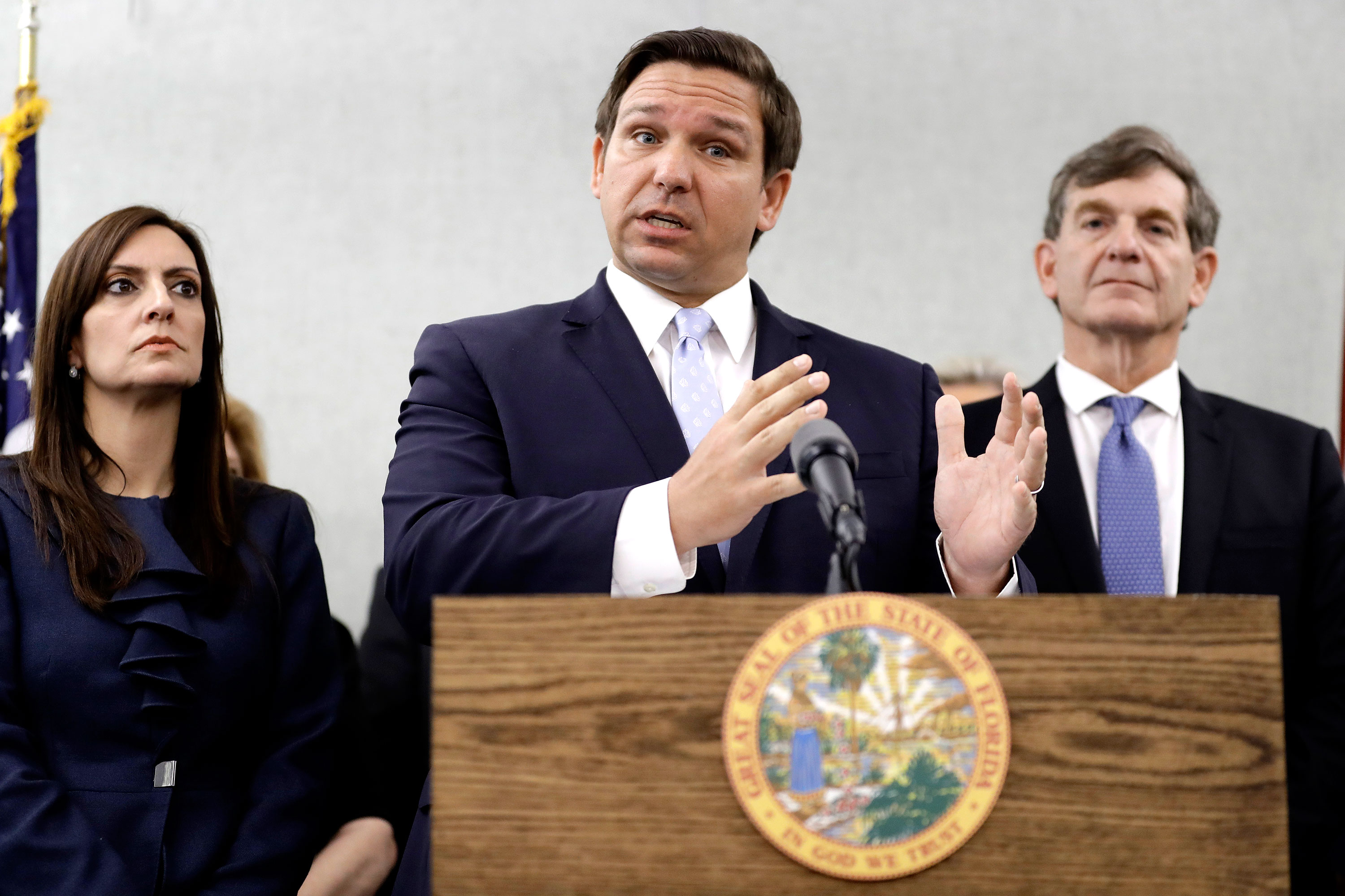 Florida Governor Ron DeSantis, center, speaks about coronavirus cases at a news conference in Tampa, Florida on March 2. 