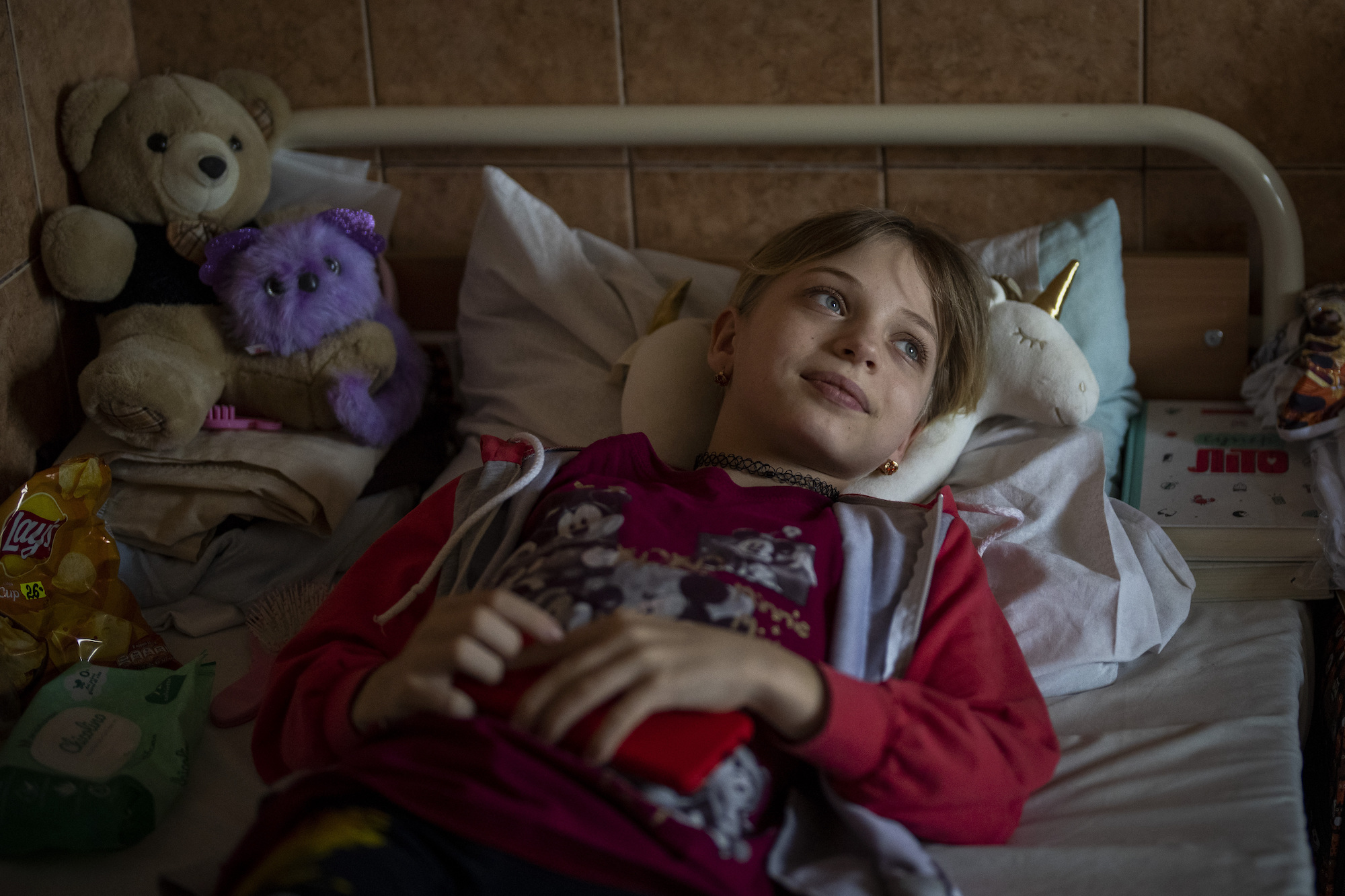 Yana Stepanenko lies in her bed at a public hospital in Lviv on May 12, 2022.