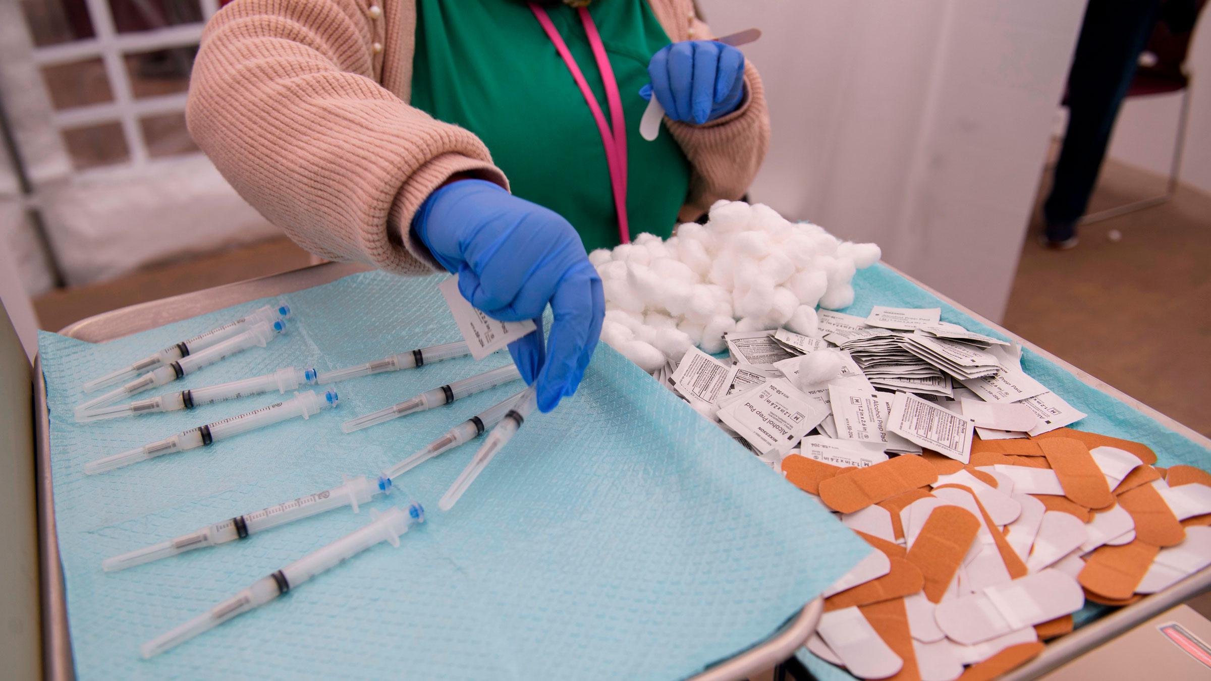 Syringes filled with the Covid-19 vaccine wait to be administered at a community health center in Los Angeles on Monday.