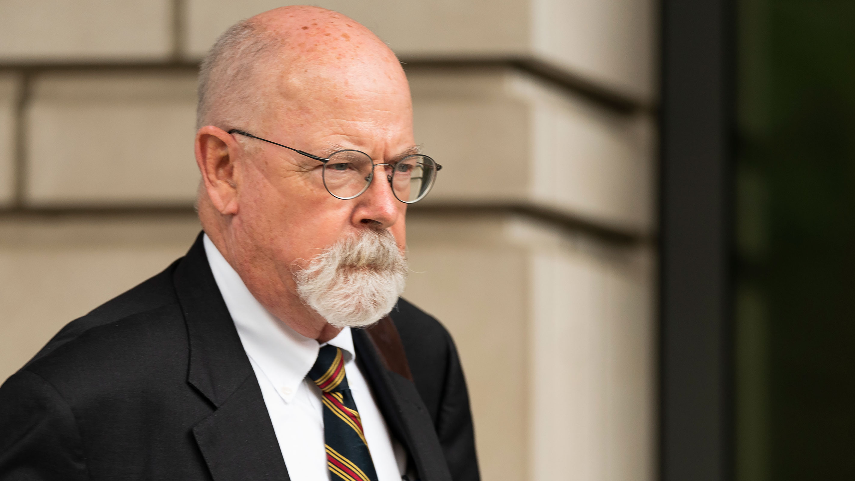 Special counsel John Durham leaves federal court in Washington, DC, in May.