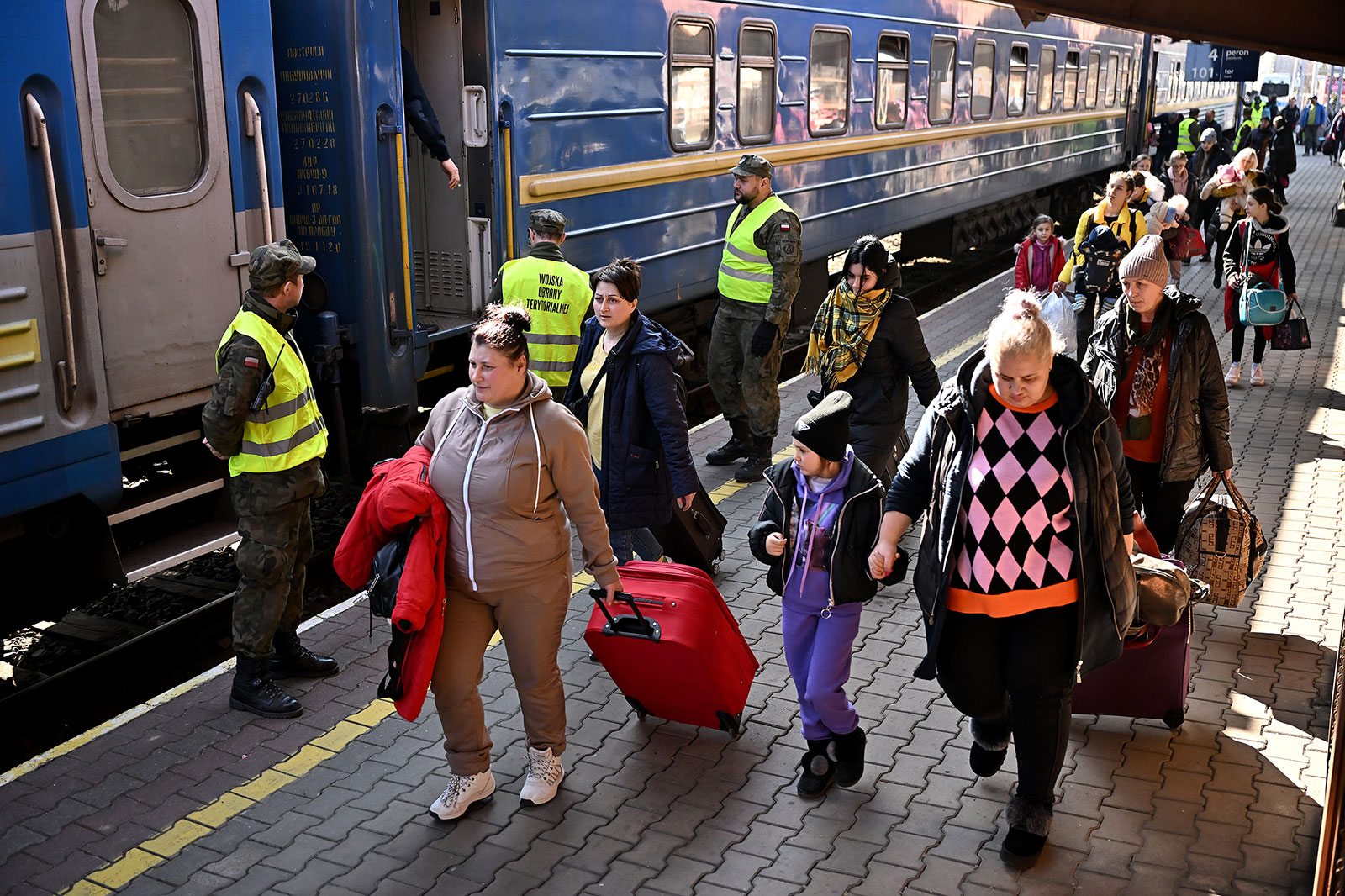 People arrive at a train station in Przemysl, Poland, from Kyiv, Ukraine, on March 20.