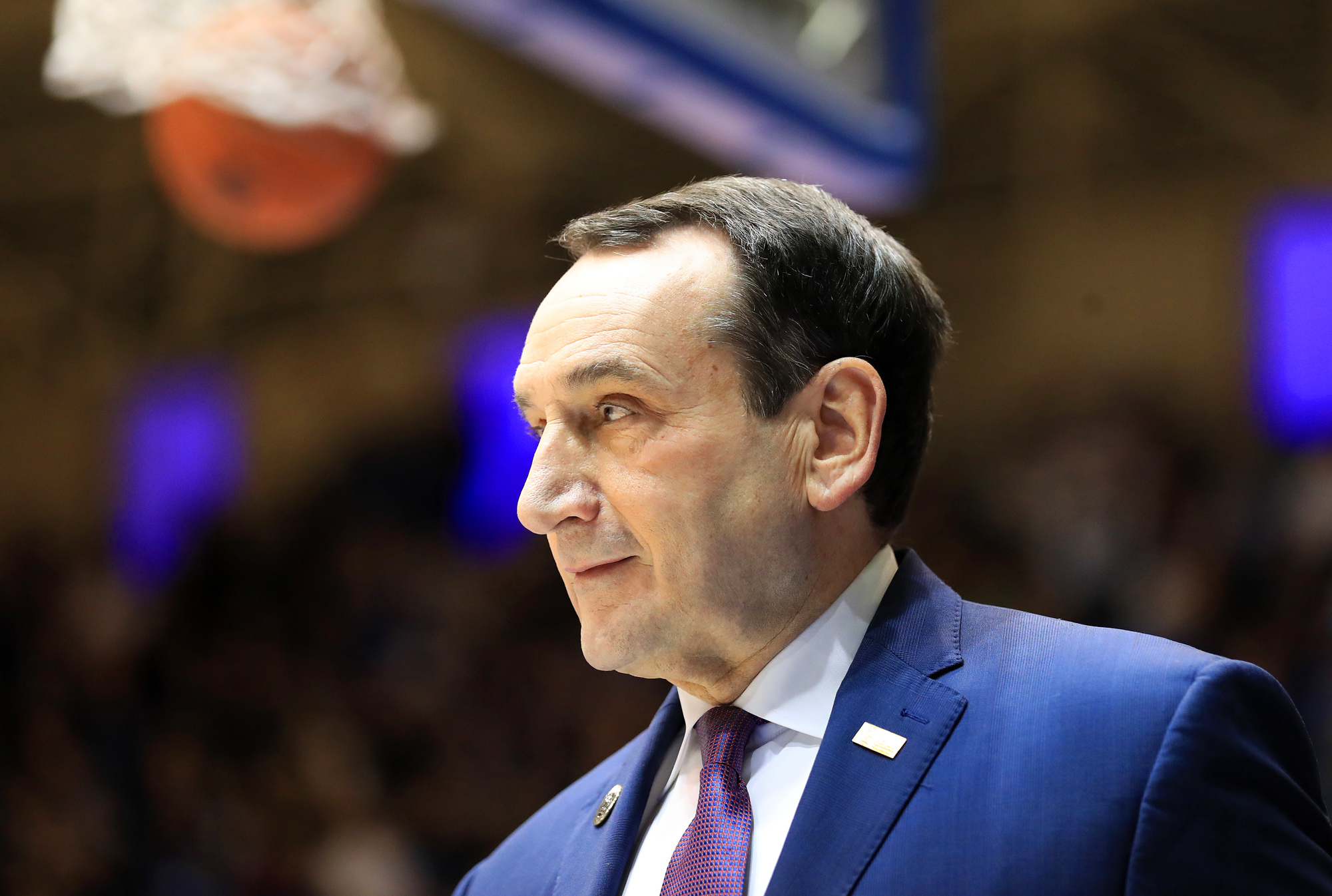 Head coach Mike Krzyzewski of the Duke Blue Devils watches on before a game at Cameron Indoor Stadium on February 15 in Durham, North Carolina.