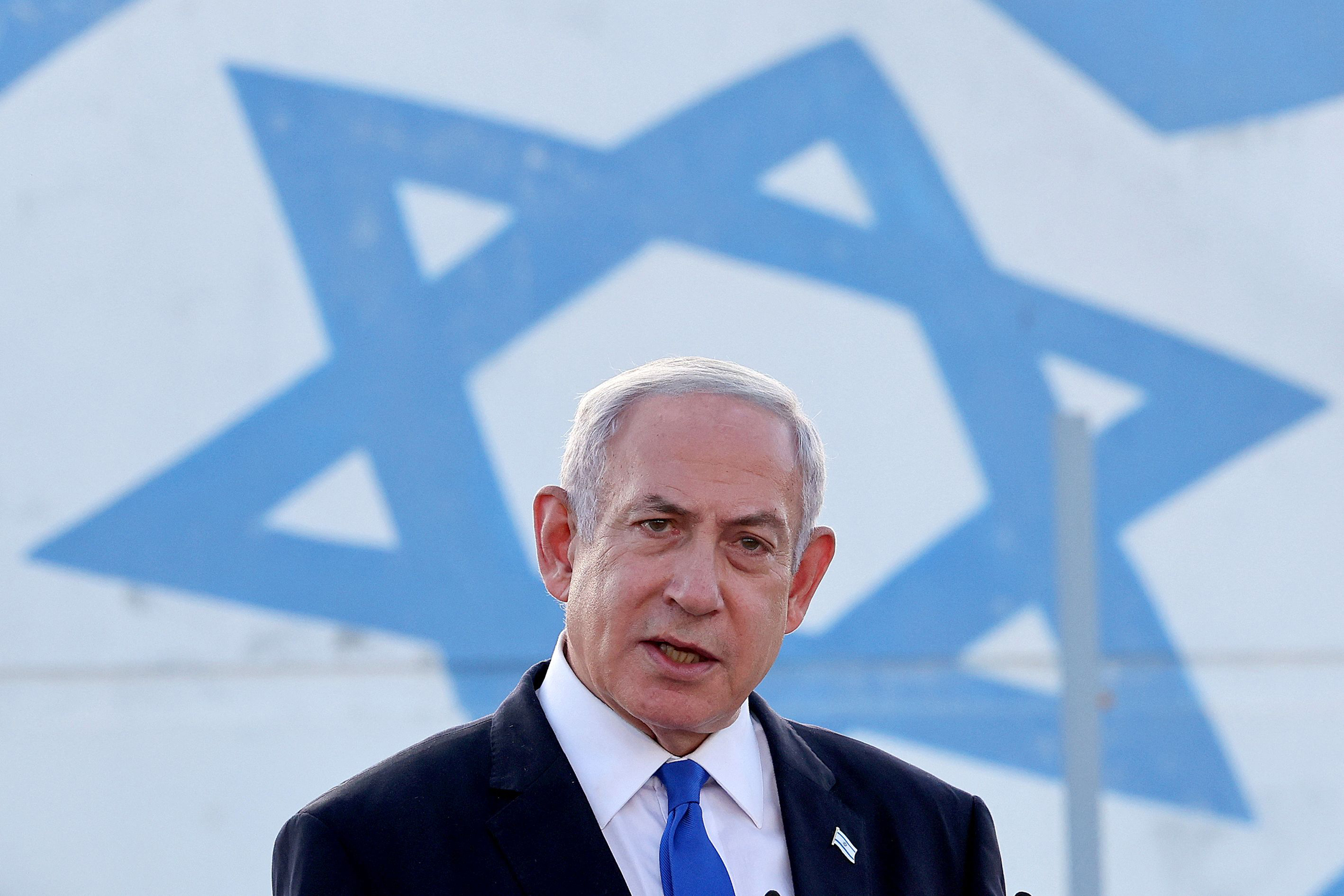 Israeli Prime Minister Benjamin Netanyahu delivers a speech during his visit to an Israeli unmanned aerial vehicle (UAV) centre, at the Palmachim Airbase near the city of Rishon LeZion on July 5.