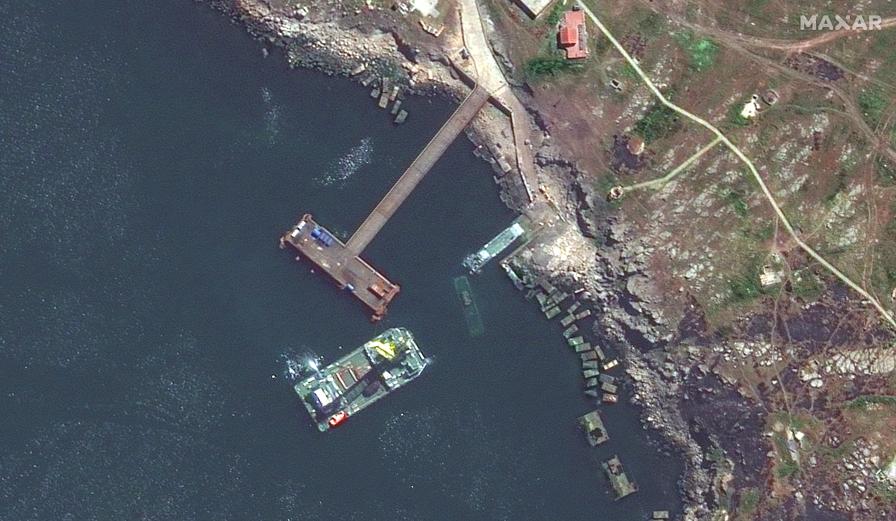 A Serna-class landing ship and another sunken vessel seen near the Snake Island on May 12.
