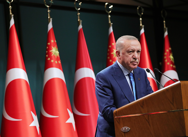 Erdogan speaks during a televised address following a cabinet meeting, in Ankara, Turkey, Thursday, August 19.