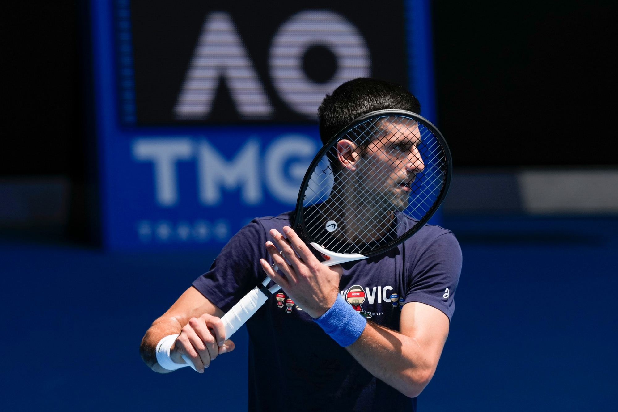 Novak Djokovic practices on Rod Laver Arena ahead of the Australian Open tennis championship in Melbourne, Australia, on January 12.