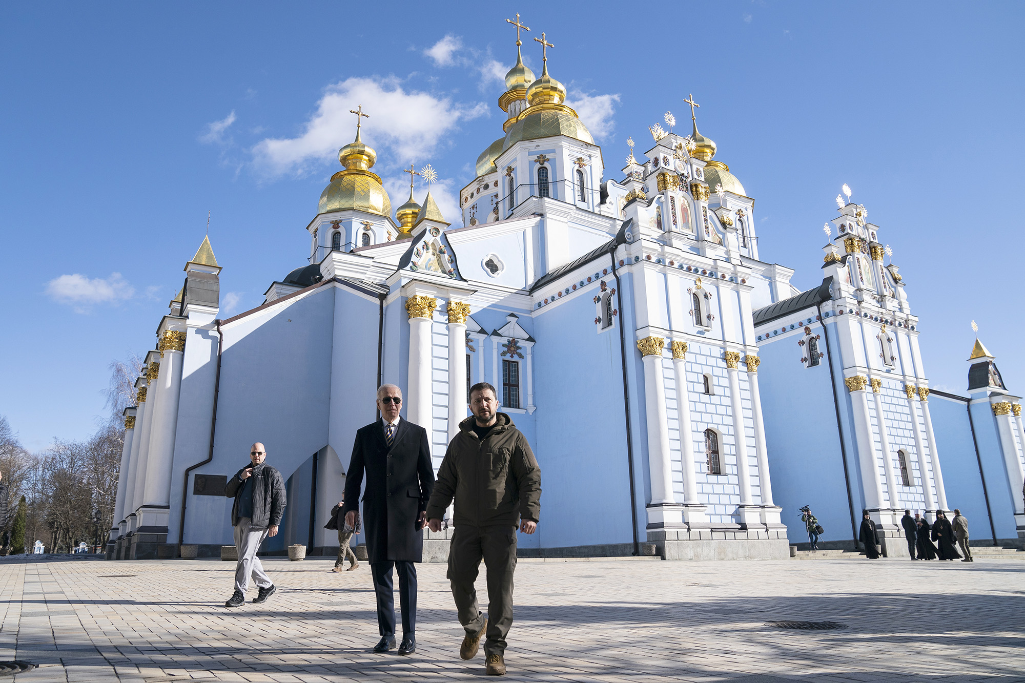 President Joe Biden walks with Ukrainian President Volodymyr Zelensky at St. Michael's Golden-Domed Cathedral in Kyiv, Ukraine, on February 20.