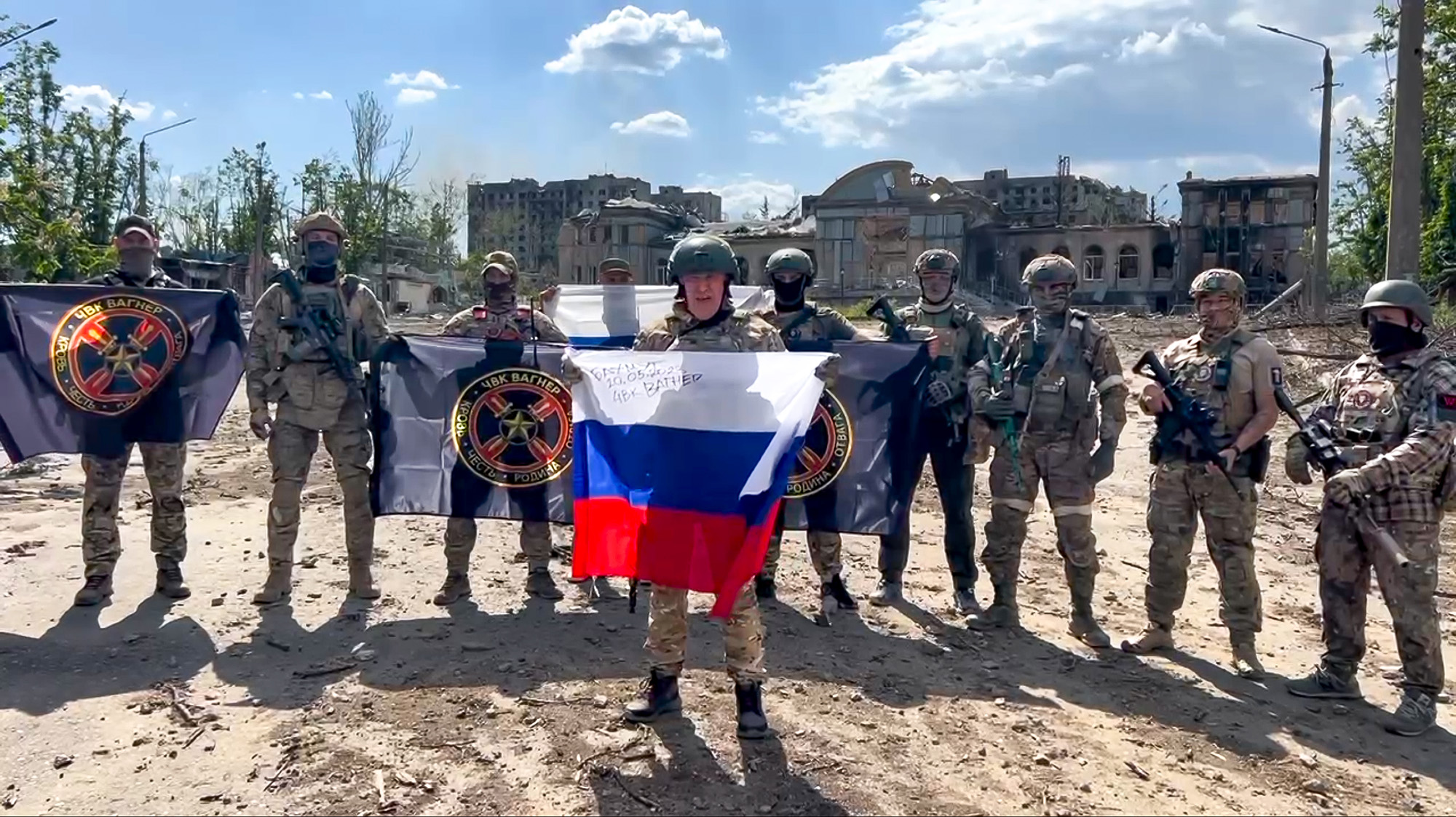 In this grab taken from video and released by Prigozhin Press Service on May 20, 2023, Yevgeny Prigozhin, the head of the Wagner Group military company speaks holding a Russian national flag in front of his soldiers in Bakhmut, Ukraine.