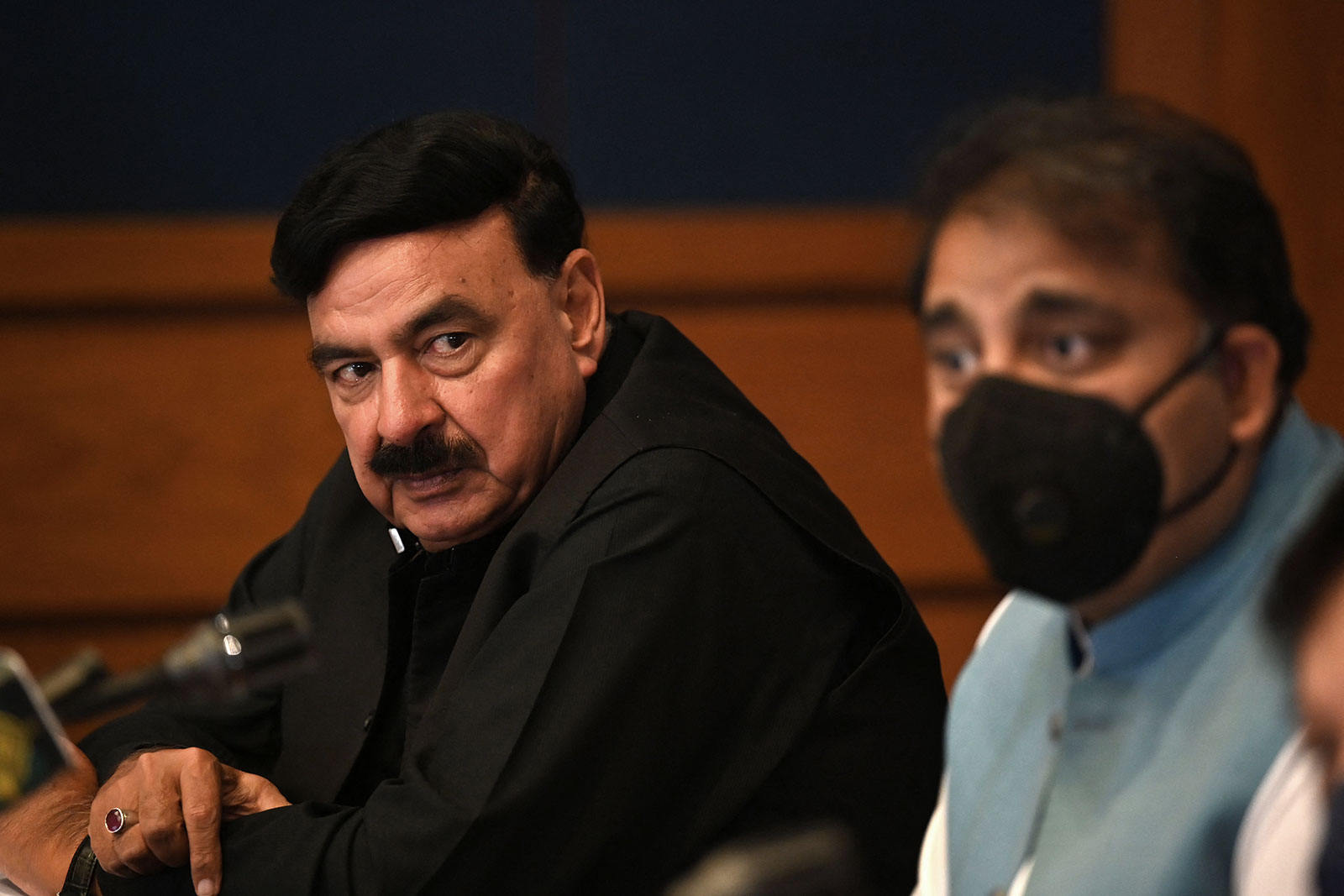Pakistan’s Interior Minister Sheikh Rashid Ahmed, left, has announced that the government of Pakistan has decided to relax the visa policy for foreign journalists and media workers stranded in Afghanistan.