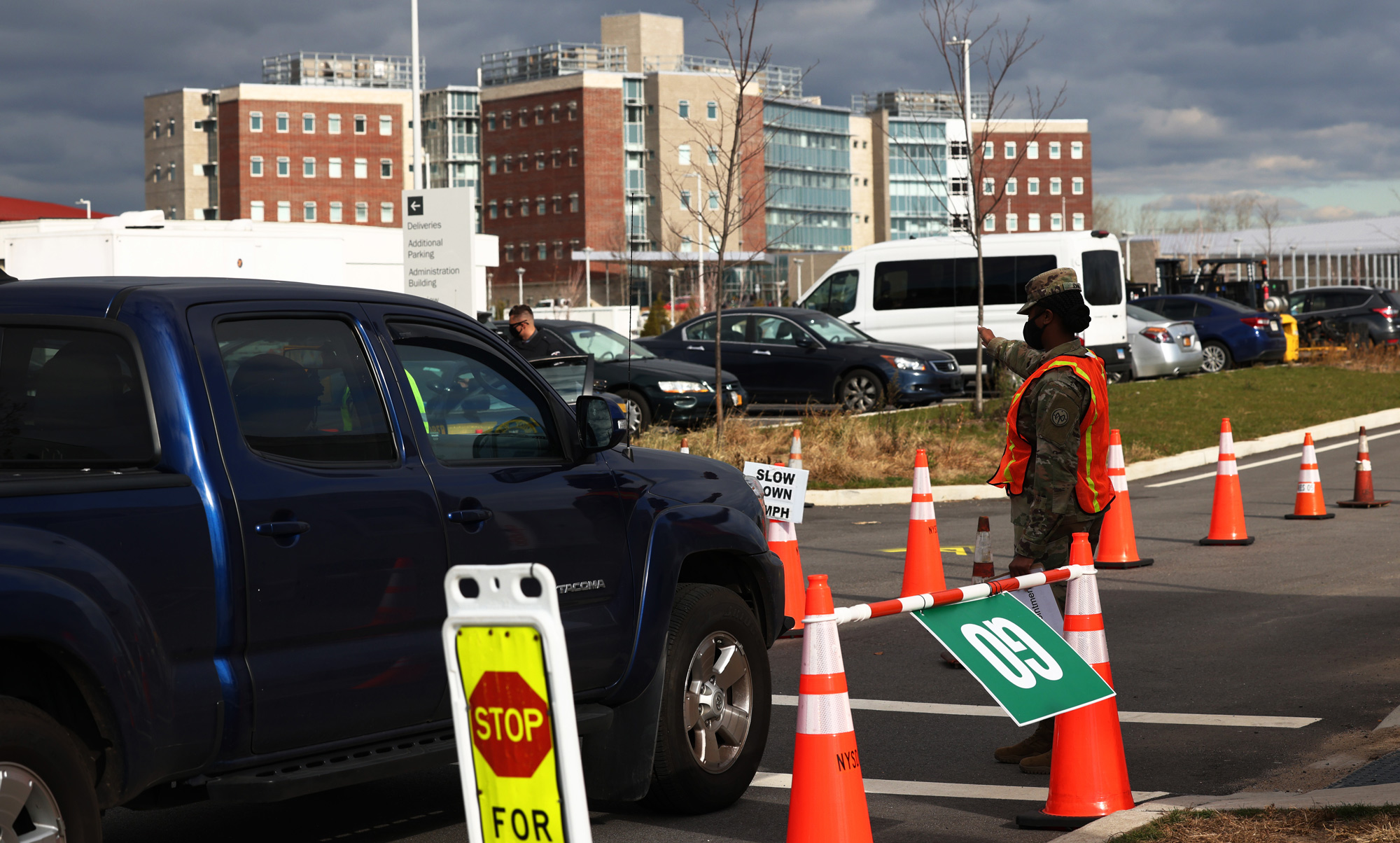 A National Guard soldier directs an incoming car at coronavirus testing site on November 24 in New York City. 